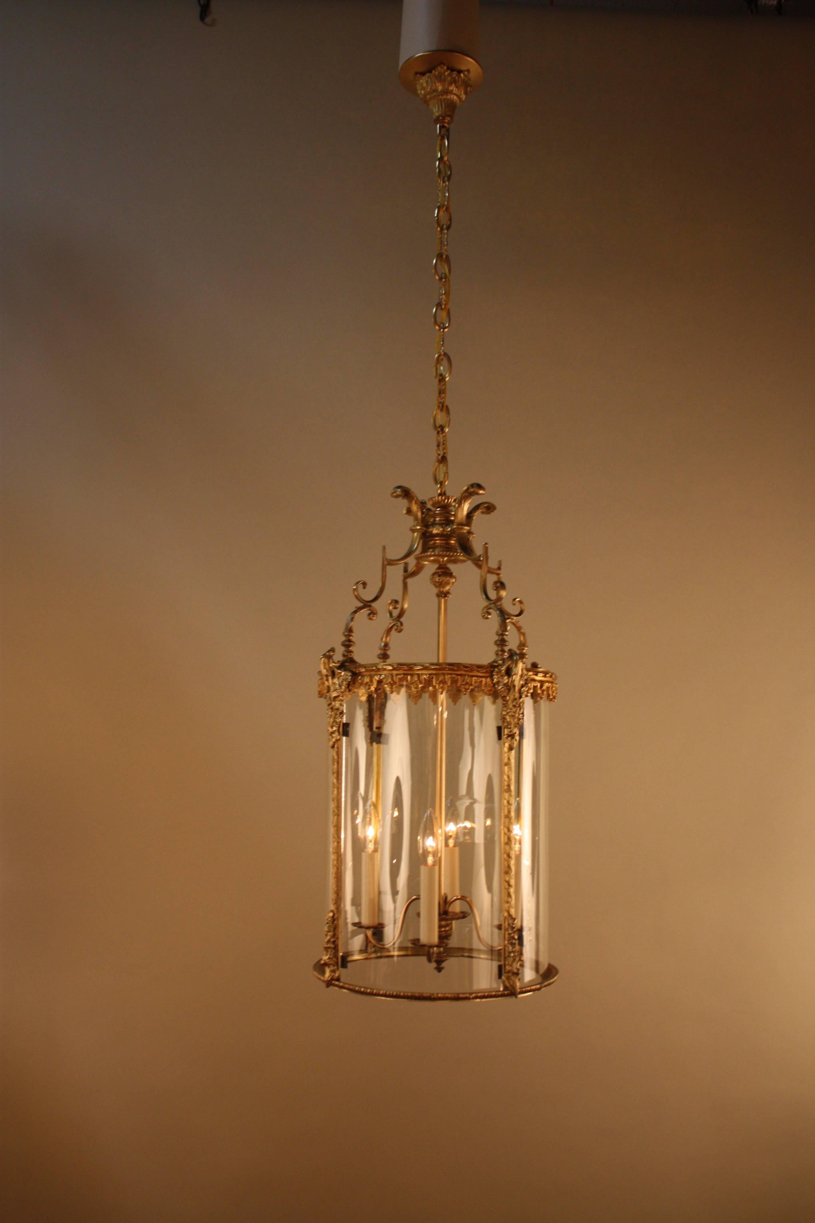 A Fabulous 1920's four light French bronze lantern.

Minimum height fully installed with 1 link of chain and canopy is 33".
