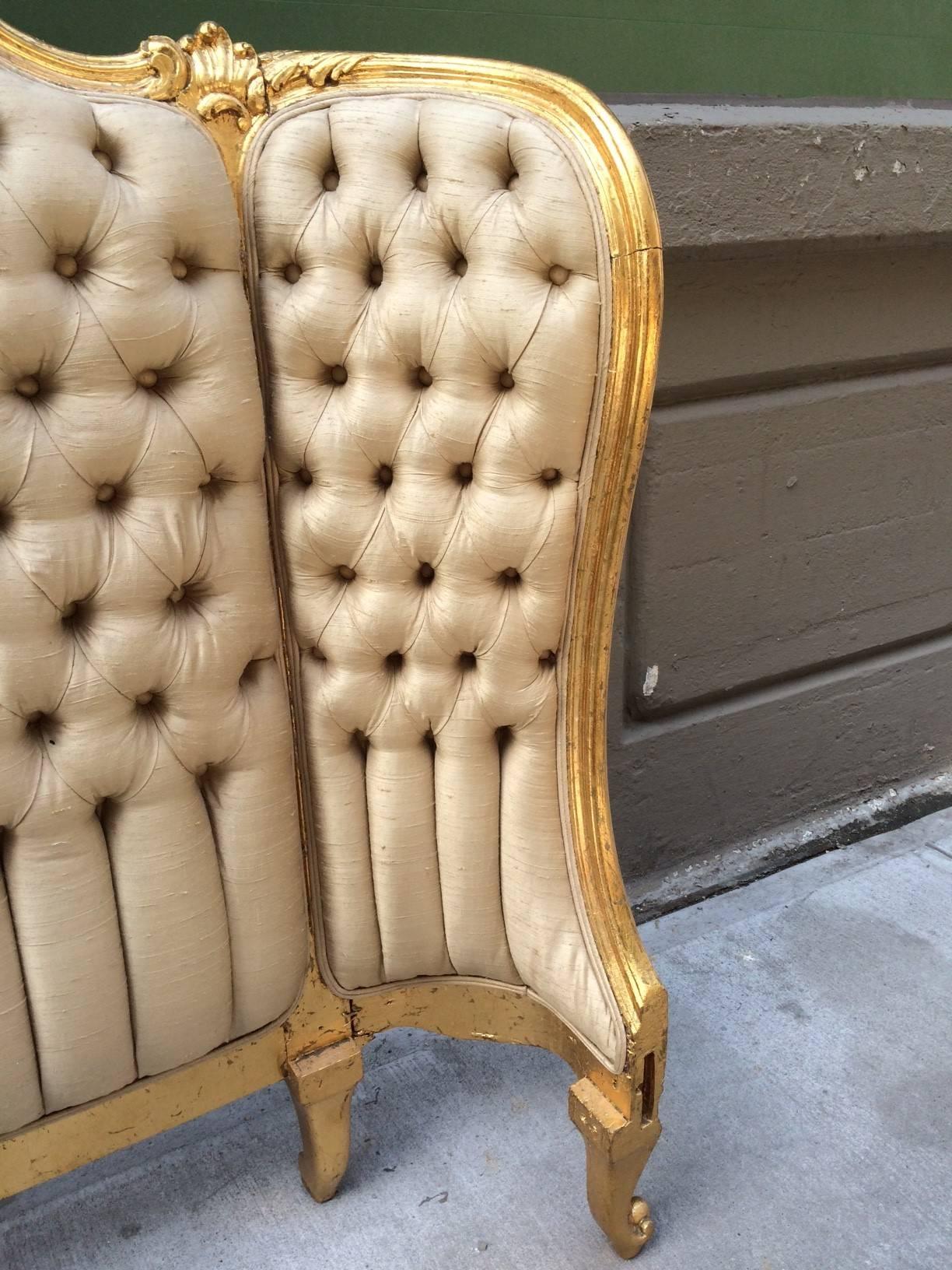 Louis XV style tufted gilt headboard.
Entire measurements:  48.5"H x 57"W x 14"D
From hole to hole:  55"W 
