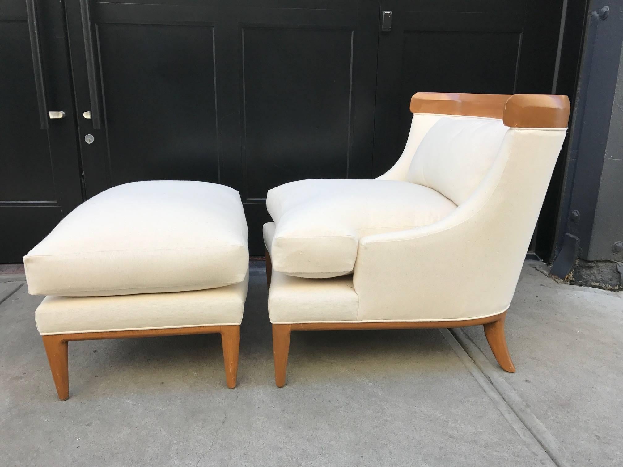 Lounge chair and ottoman by Erwin Lambeth. Sculptured wood frame and newly upholstered.