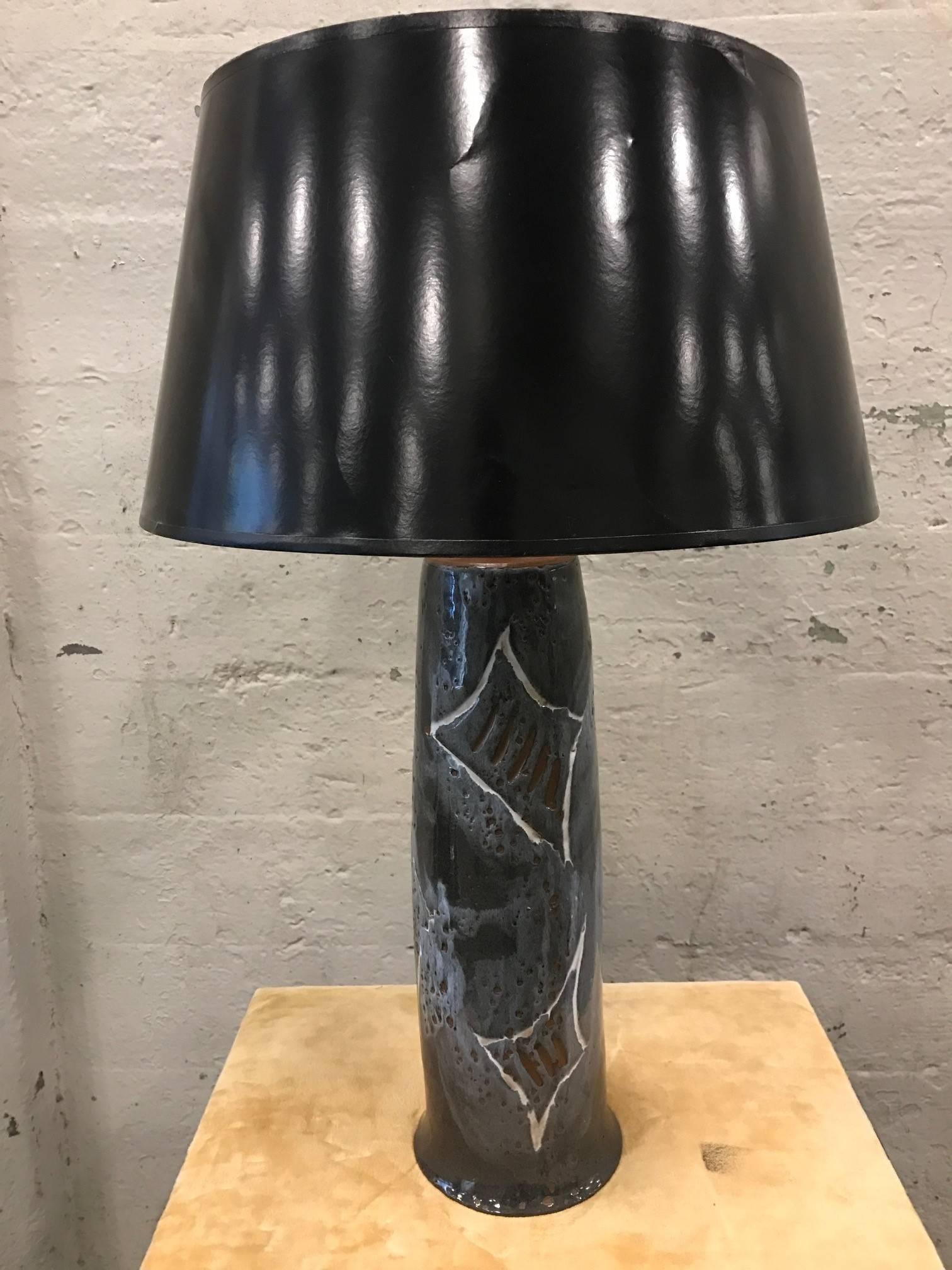 Mid-Century Modern art pottery lamp. Very nice painted abstract pattern. Style of Martz.
Shade not included.
Measures: 27H (top of finial) under bulb socket: 17.25 H; Body is 6 in diameter.