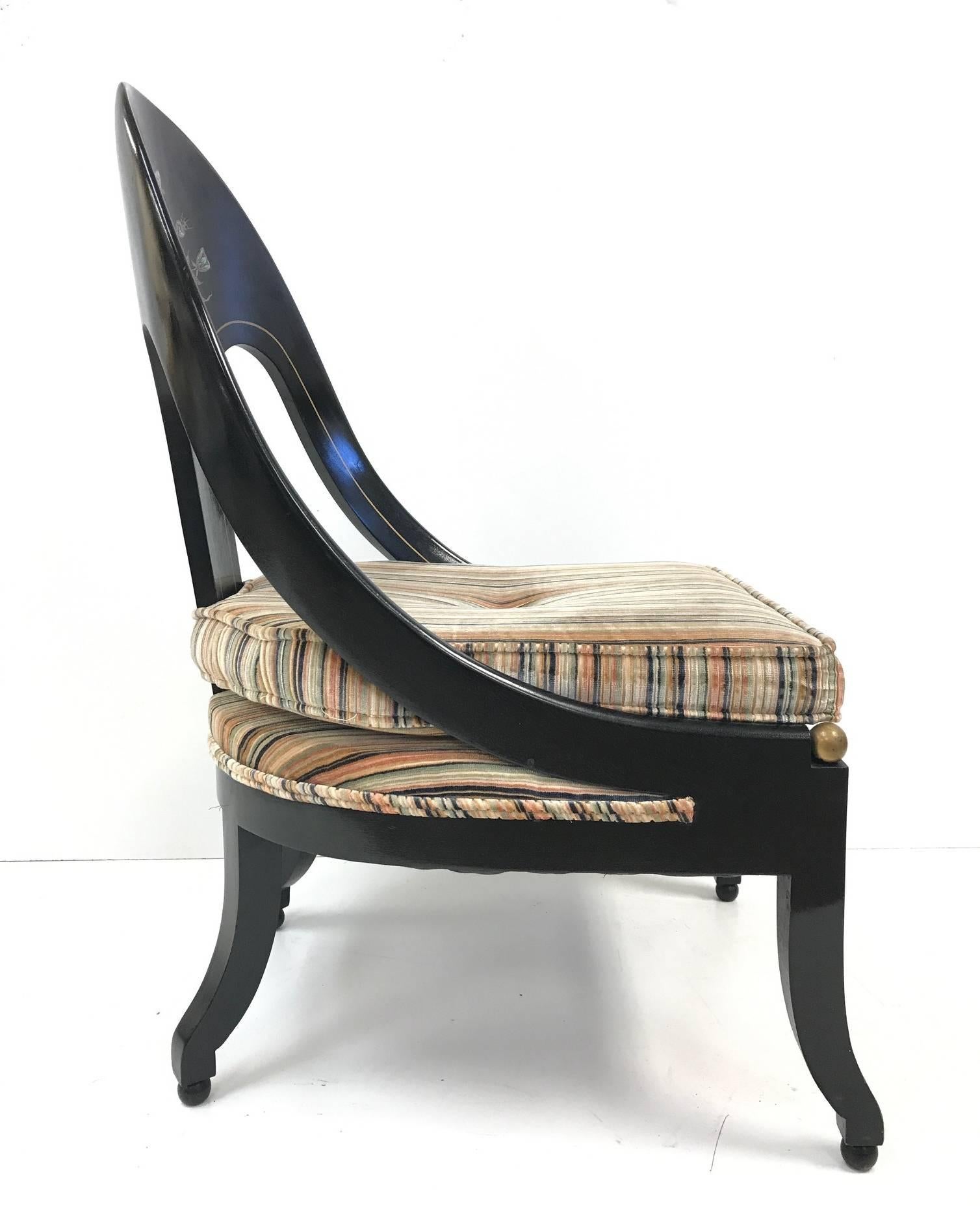 Chairs have black lacquered frames, original upholstered seating, a floral mother-of-pearl inlay pattern with gold trim to the back of the chairs. James Mont Style. 