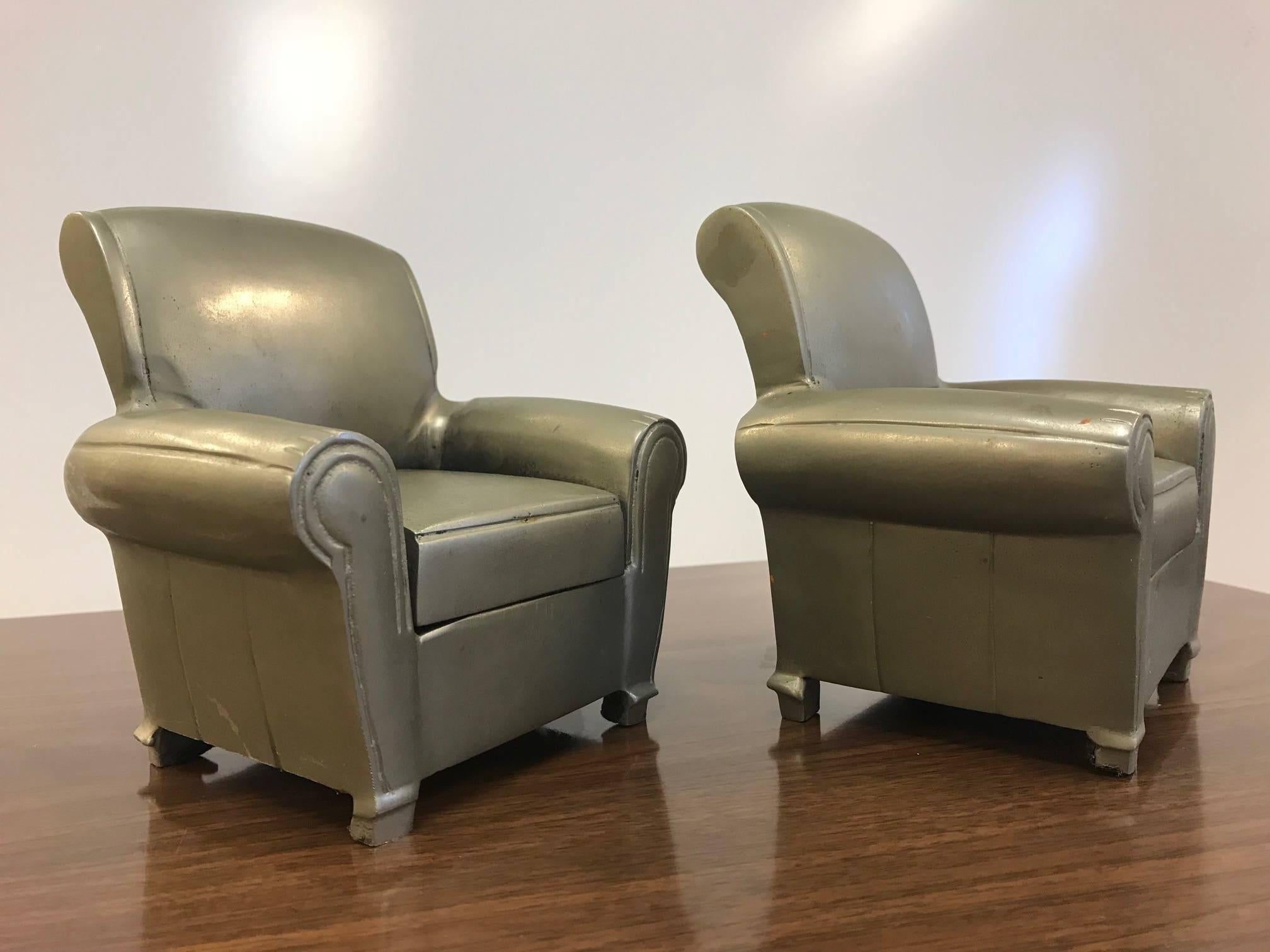 Pair of pewter lounge chair bookends.