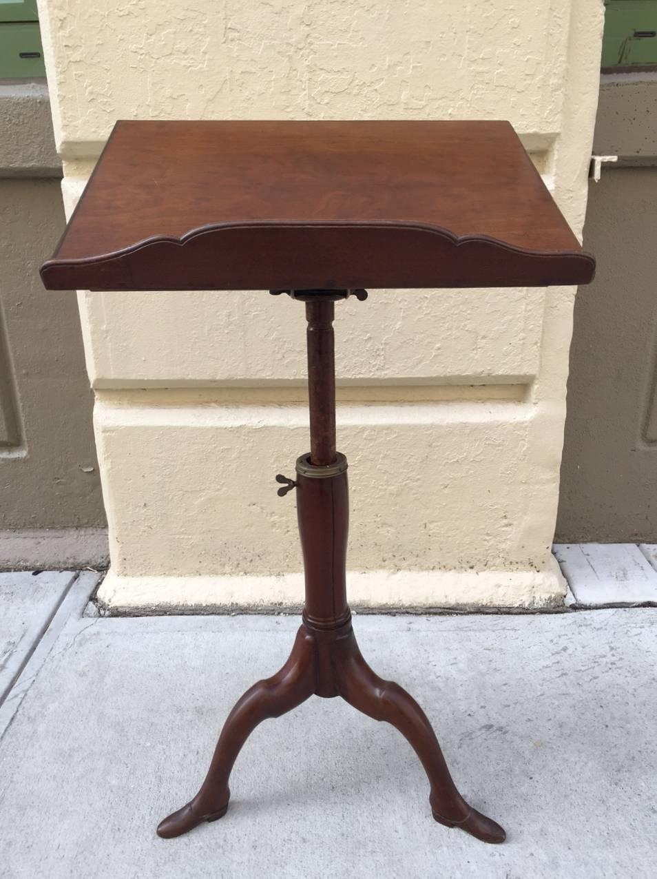 Georgian mahogany adjustable dictionary / music / reading / podium stand with carved shoe feet.  All original hardware. 

