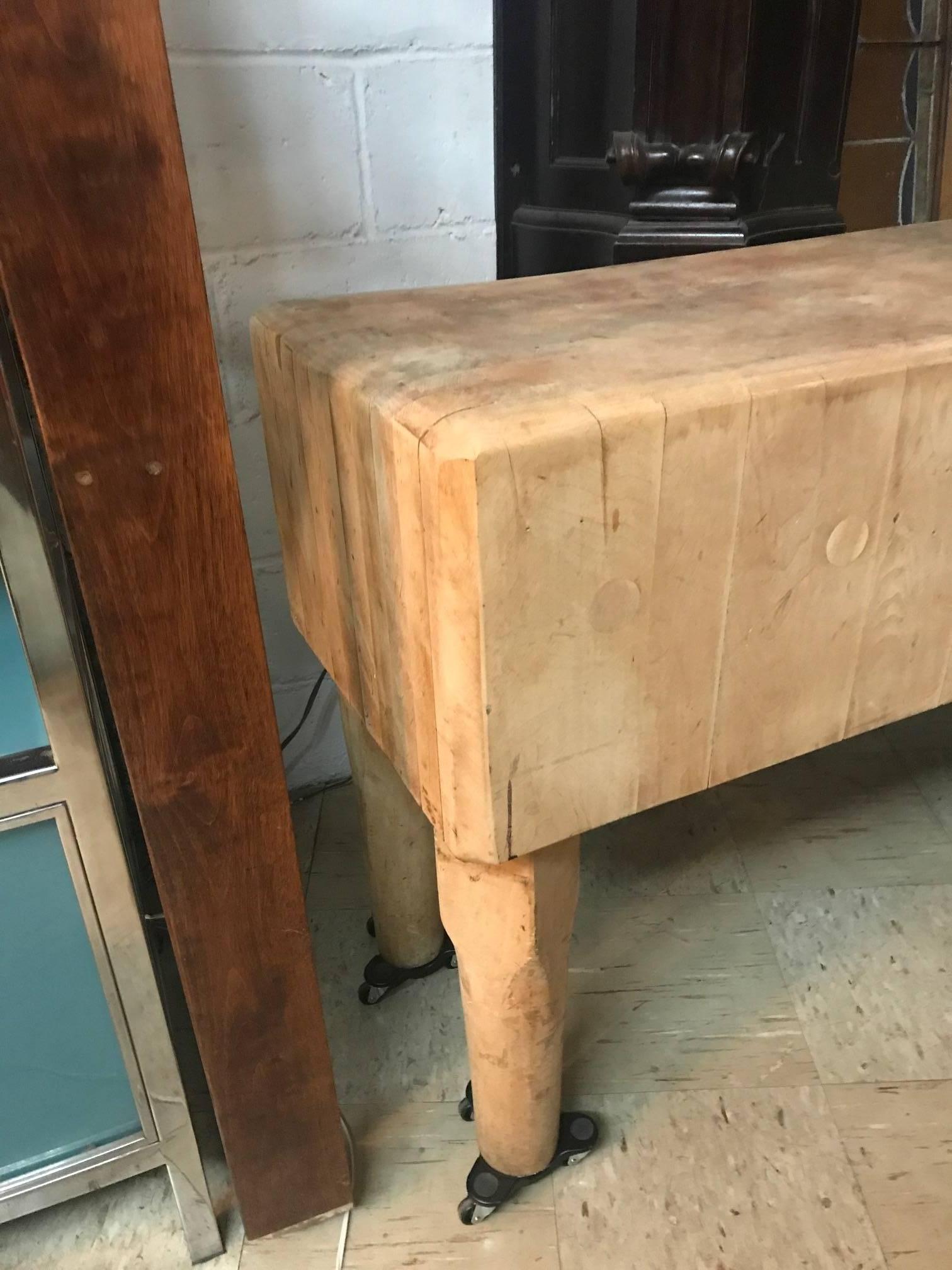 1930s, wood butcher block table. Beautifully worn from years of use. 
Has dove-tail joinery. Nice compliment for an Industrial interior.  Casters not included. 
    