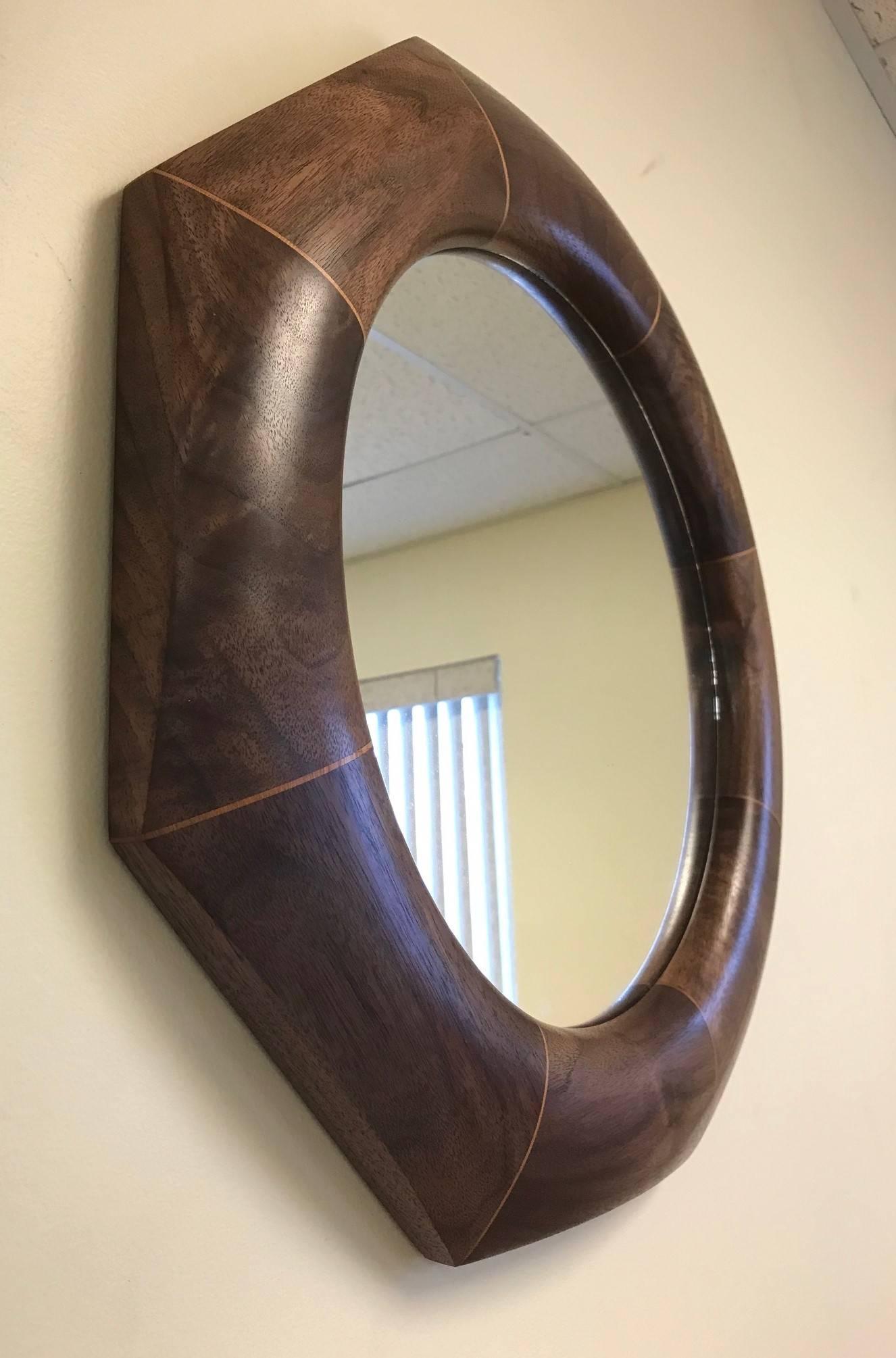 Custom solid walnut octagonal mirror.  
The mirror listed is currently available.