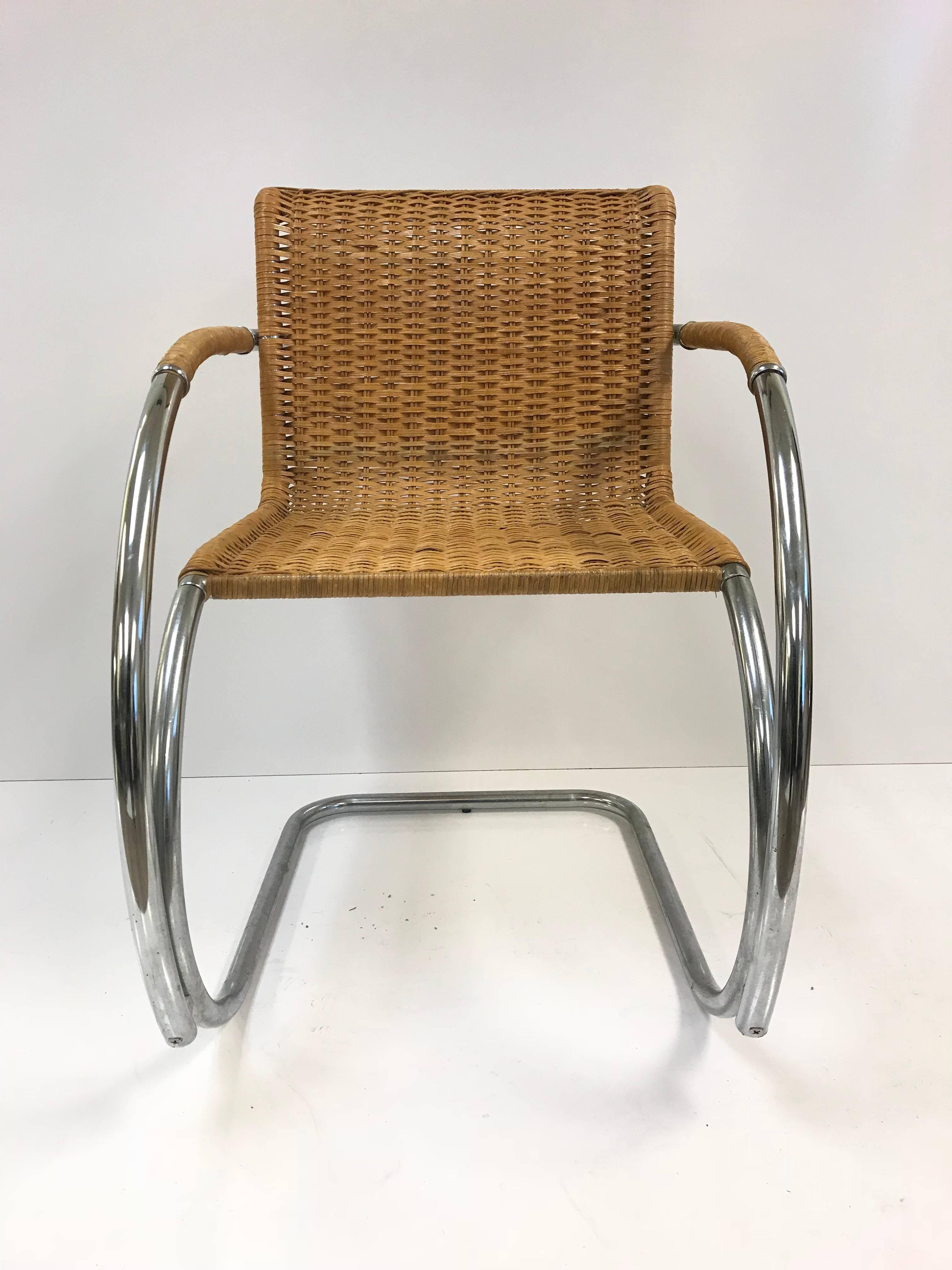 Set of four Ludwig Mies van der Rohe MR20 chairs.  Wicker chairs with a chromed steel frame.  Nice complement to a mid century modern or Bauhaus interior.
