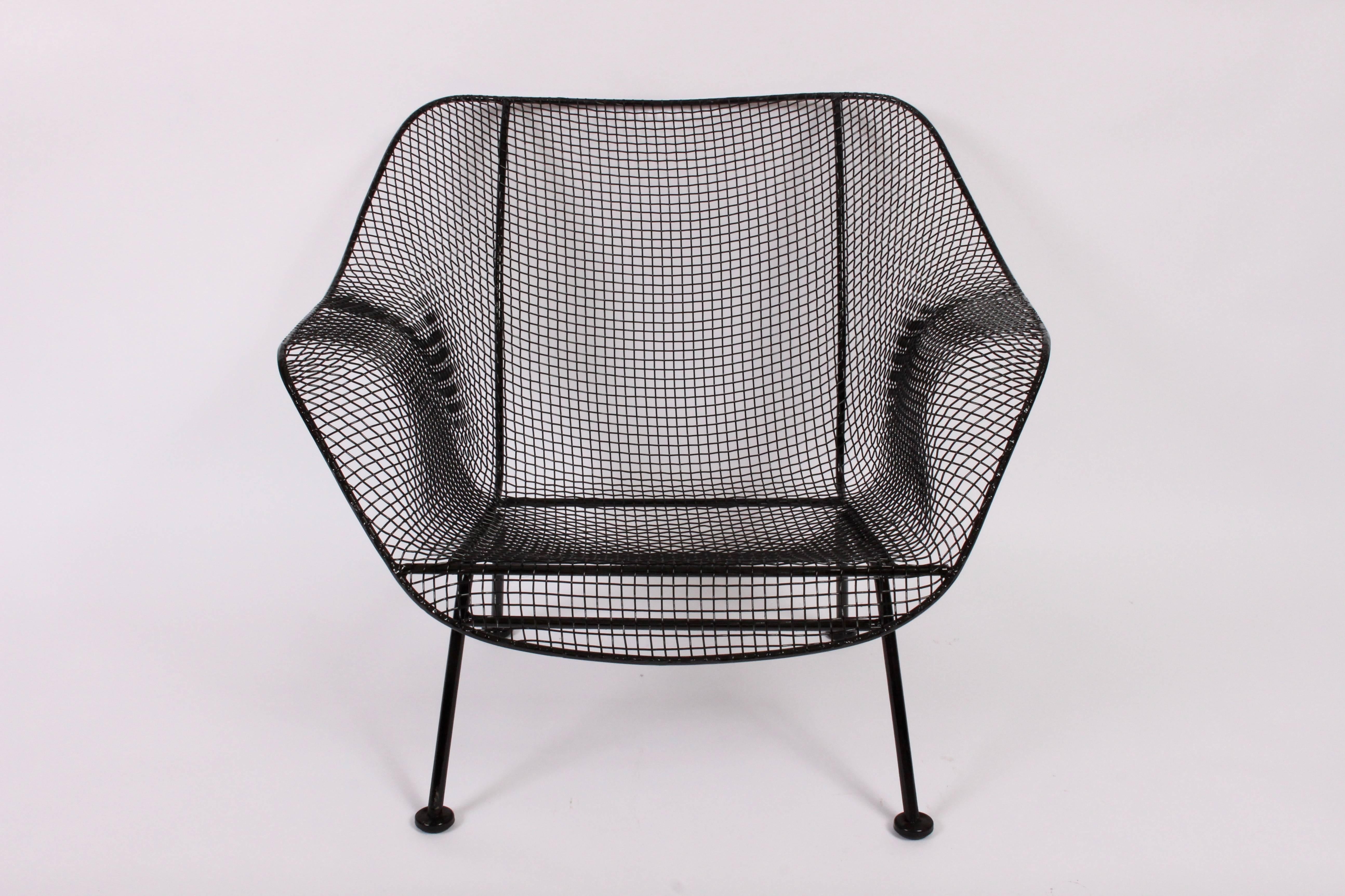 1960s Russell Woodard black sculptura collection lounge chairs. Featuring black wrought Iron frame and black wire construction. Refinished.
 