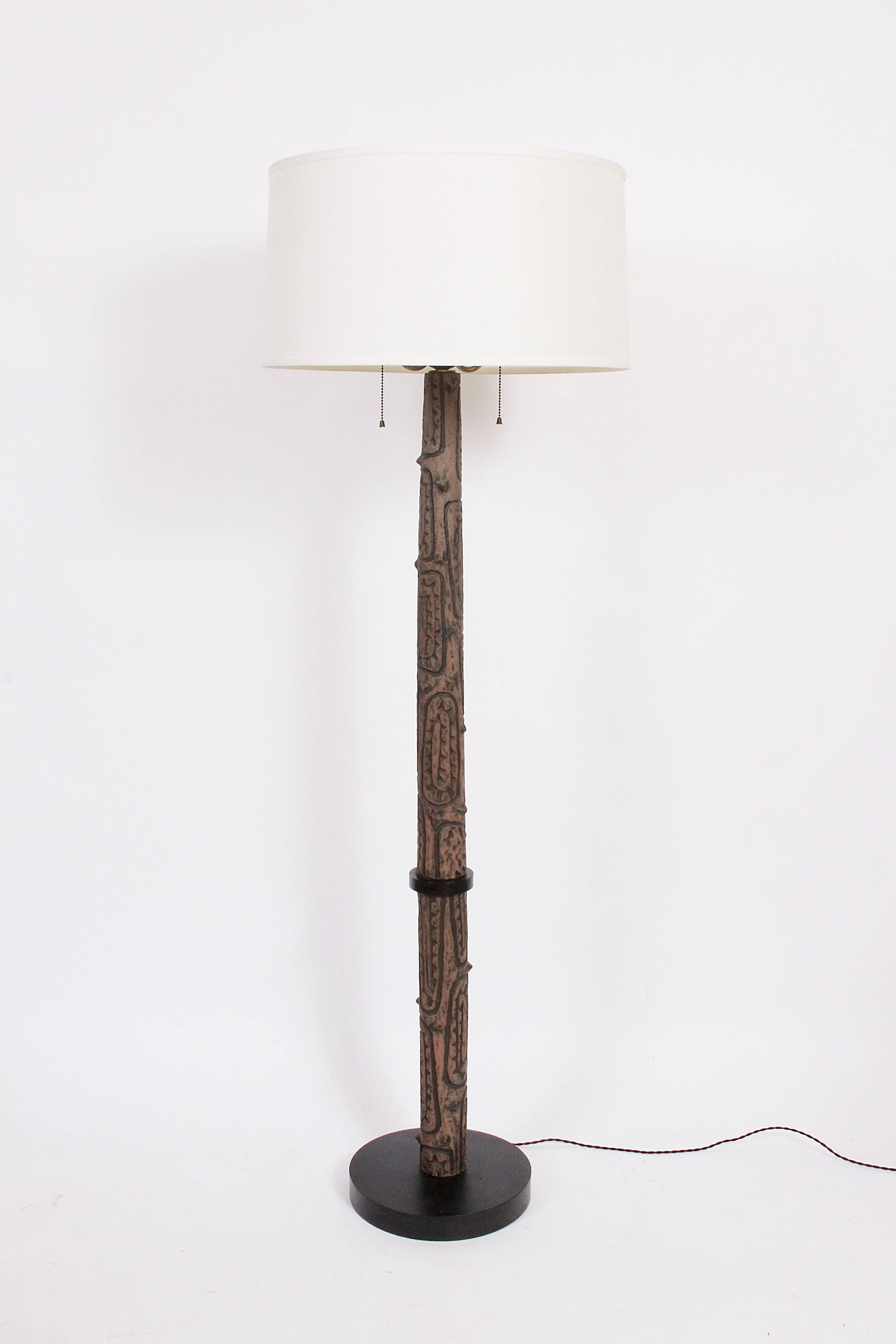 1960's Design Technics  Lee Rosen attributed Ceramic Floor Lamp with White Glass Shade. Featuring a hand crafted pattern resembling wood with smooth protruding thorn design in Brown Terracotta and Black.  On round Black enameled wood base. With