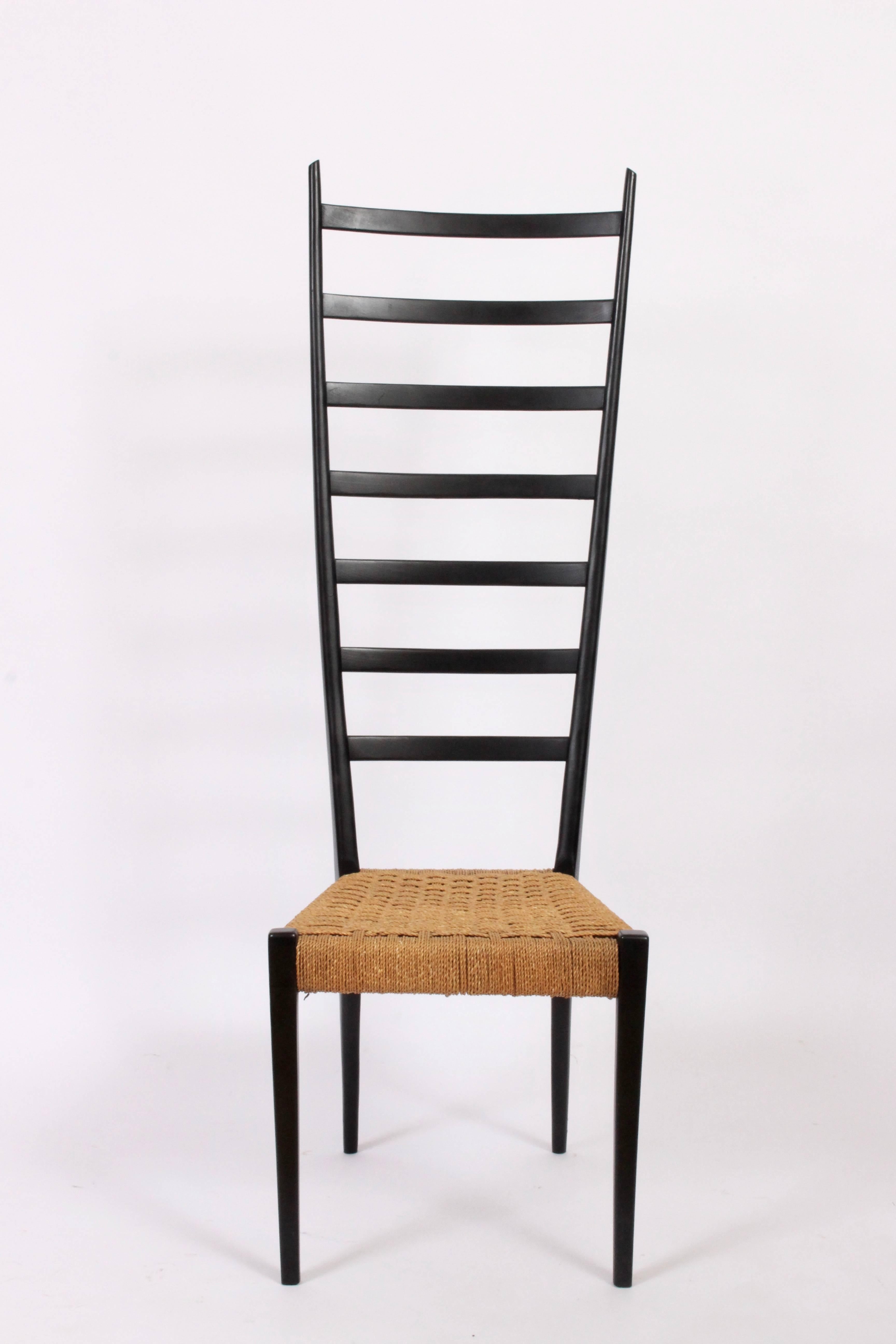 Tall Italian Modern black lacquer ladder back accent chair by Chiavari, Italy.  Featuring a slightly curved back black lacquer frame with comfortable woven rush seat. Small footprint. Sculptural. Statement seating. Without damage or repair to rush.