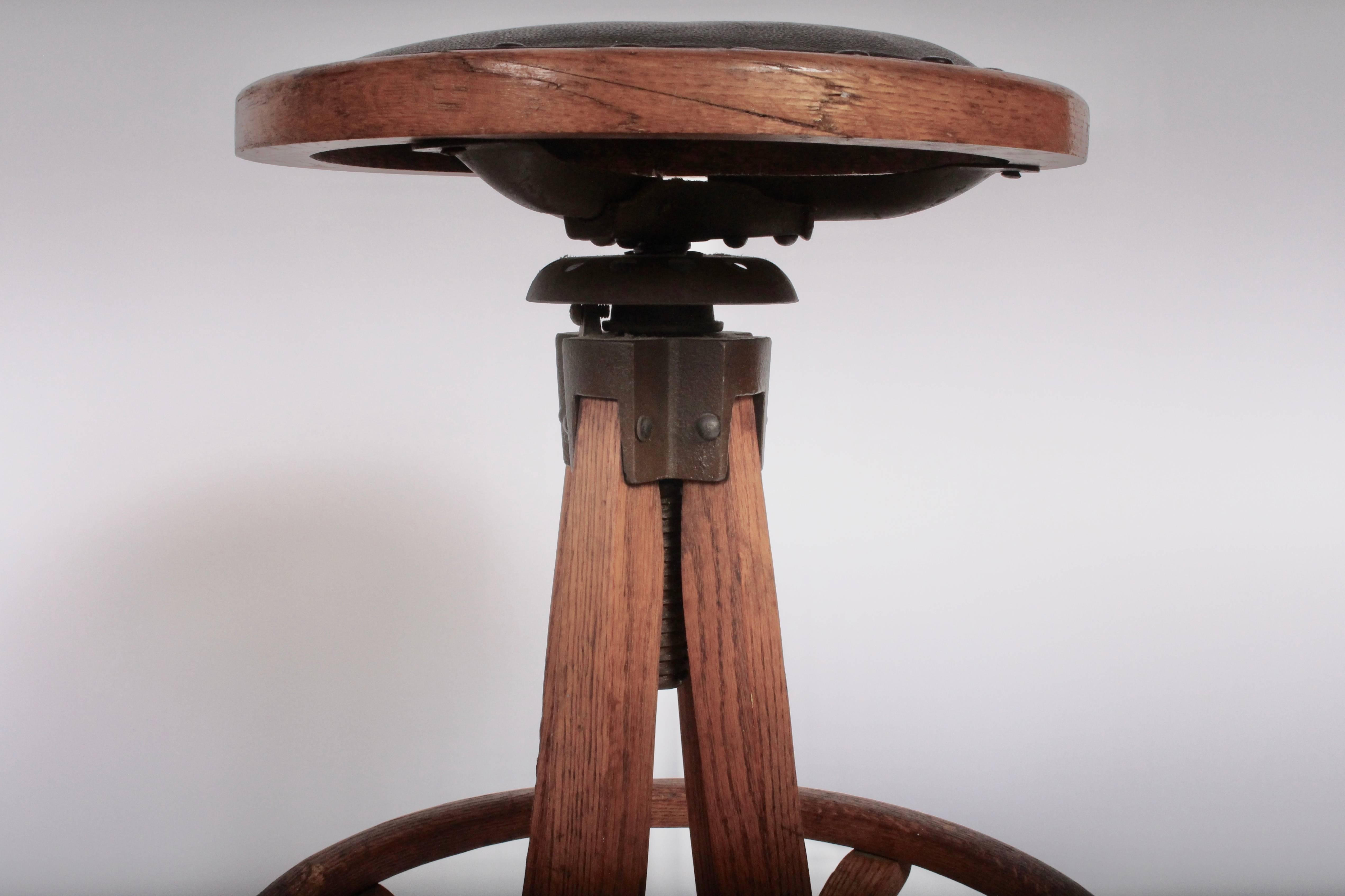 Industrial Pair of Architect Swivel Stools in Oak and Leather with Heel Ring, Circa 1910 For Sale