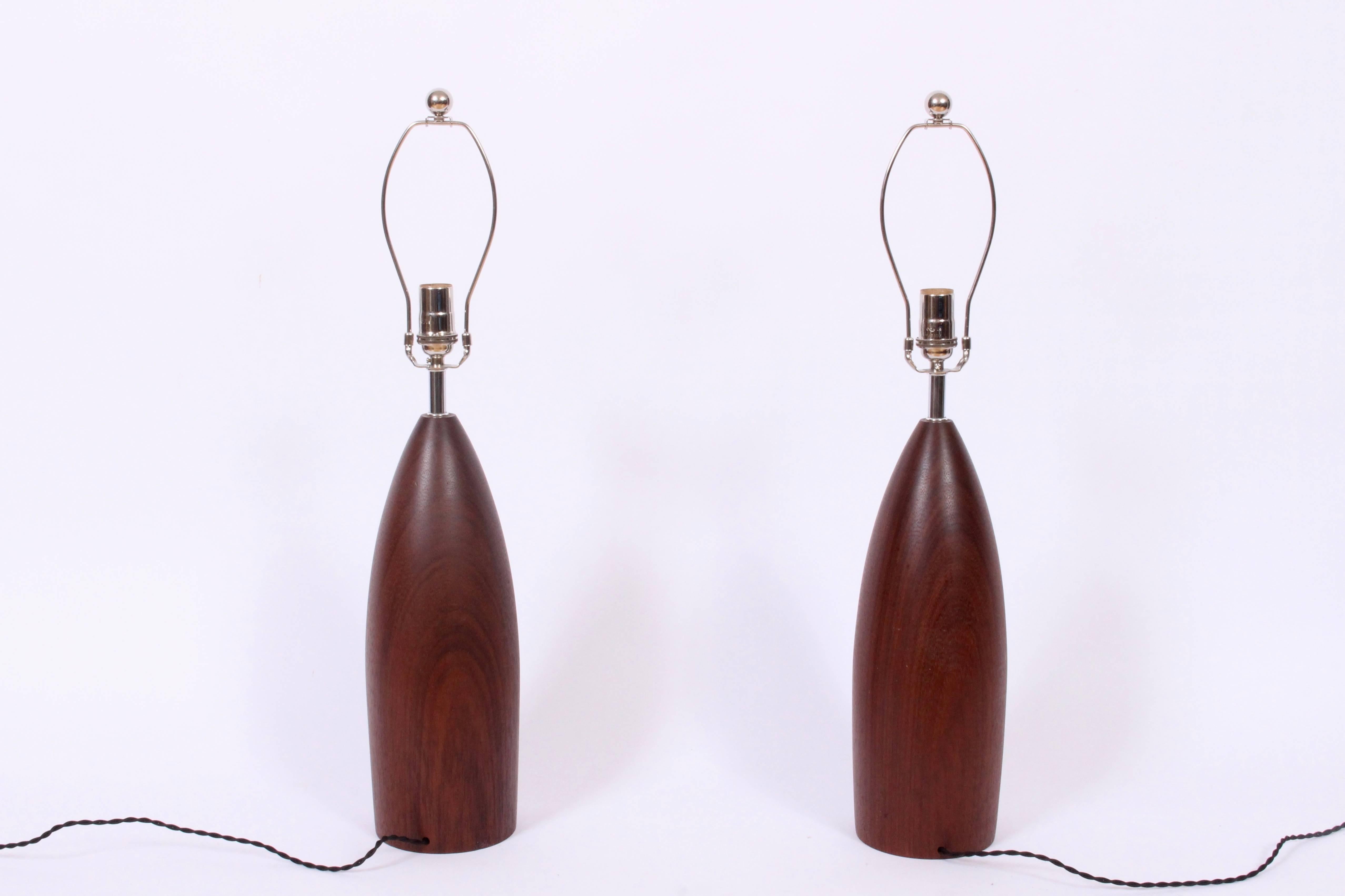 Scandinavian Modern Tall Pair of Danish Modern Solid Turned Dark Teak Table Lamps, circa 1960