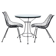 Woodard Black Cafe Set with Round Glass Table & Two Dining Chairs, 1950s