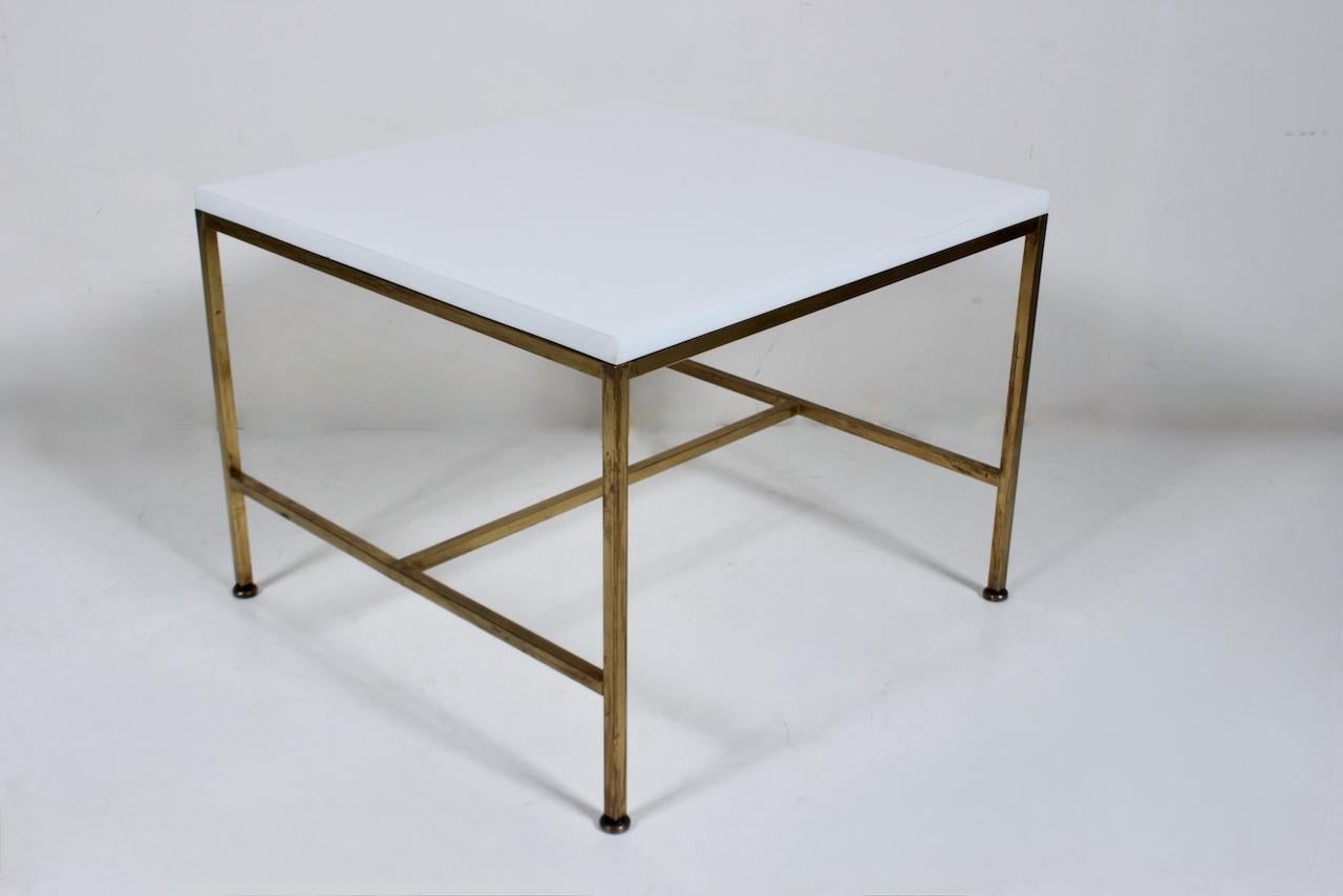 Paul McCobb Irwin Collection C8732 White Glass & Brass Square Table. Coffee Table. Side Table. End Table. Featuring a square tubular patinated Brass framework with cross brace design, Brass ball feet and smooth, reflective original .75
