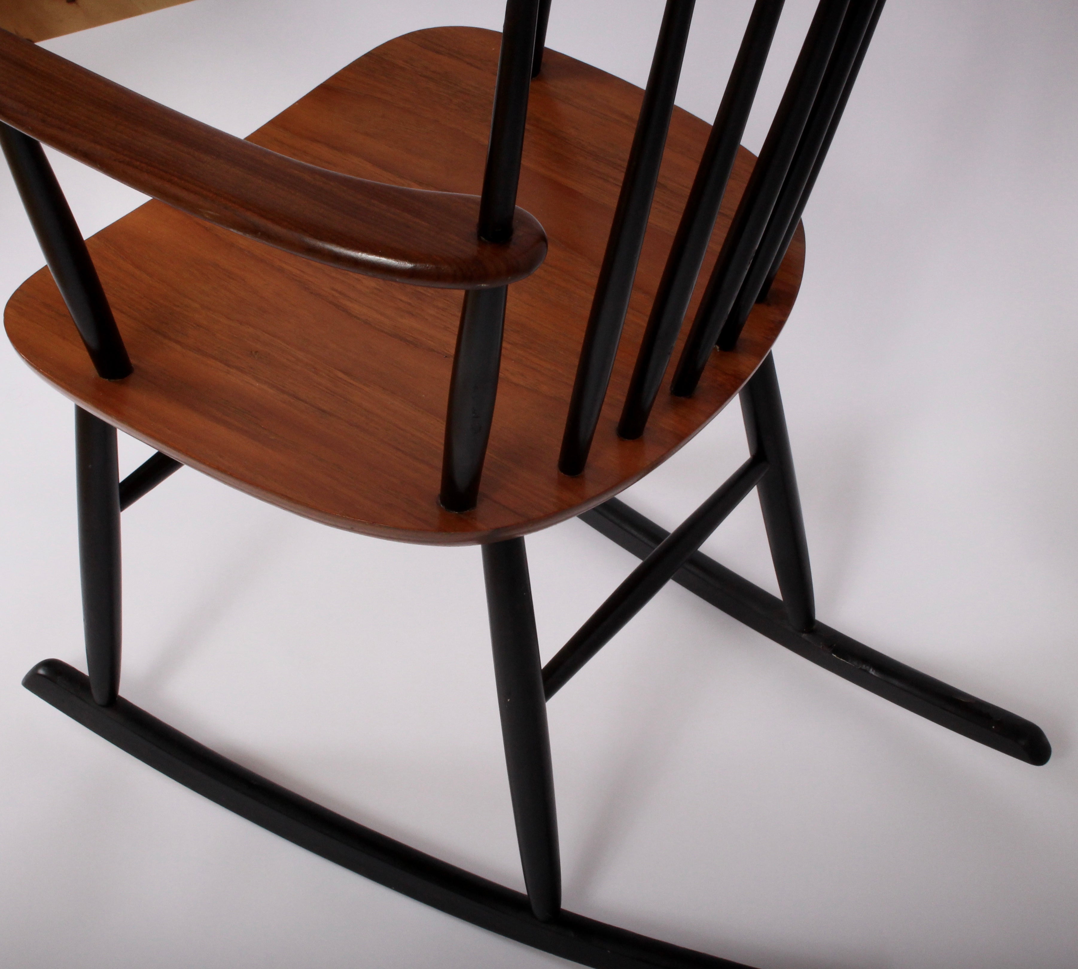 Danish Modern Teak And Black Lacquer Rocking Armchair, Circa 1960 Danish Modern Teak And Black Lacquer Rocking Armchair, Circa 1960