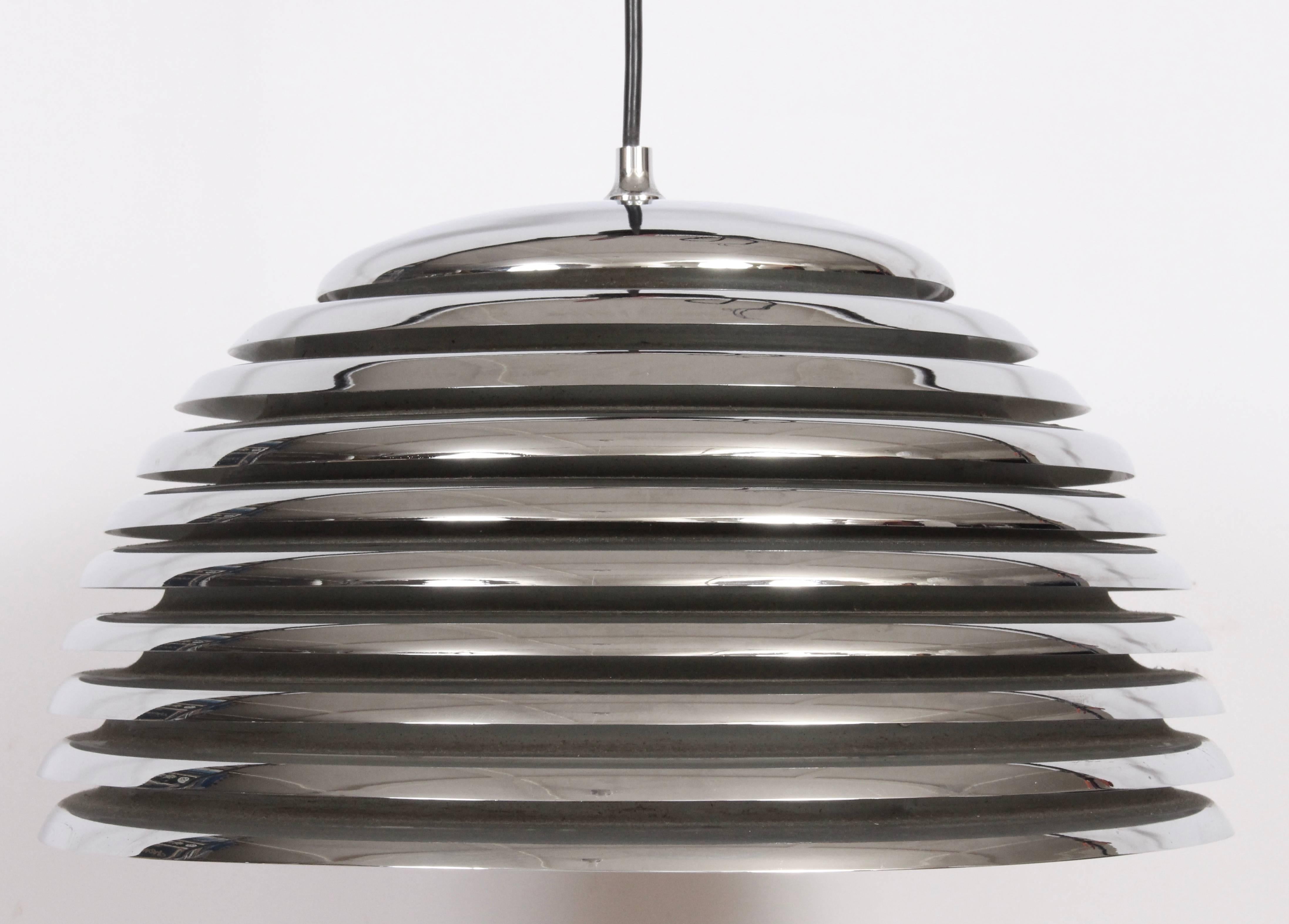 Saturno Chrome Honeycomb Pendant by Kazuo Motozawa for Staff Leutchen, Germany. Featuring reflective, rounded and vented chrome exterior rimmed rings with off white interior. Diffused light. Standard socket. Black cord. Classic. Fine design. Small