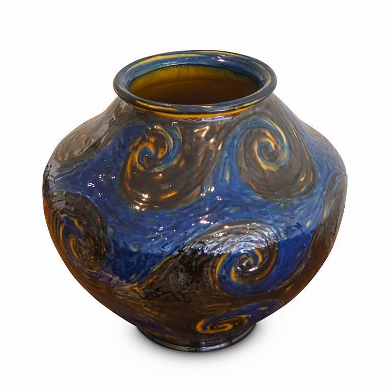 This extraordinary monumental vase by Jens Thirslund (1892-1942) for the Kähler pottery is one of the finest pieces we have seen from this pottery. It is likely to be a unique piece and has the very unusual trait of bearing the individual mark of