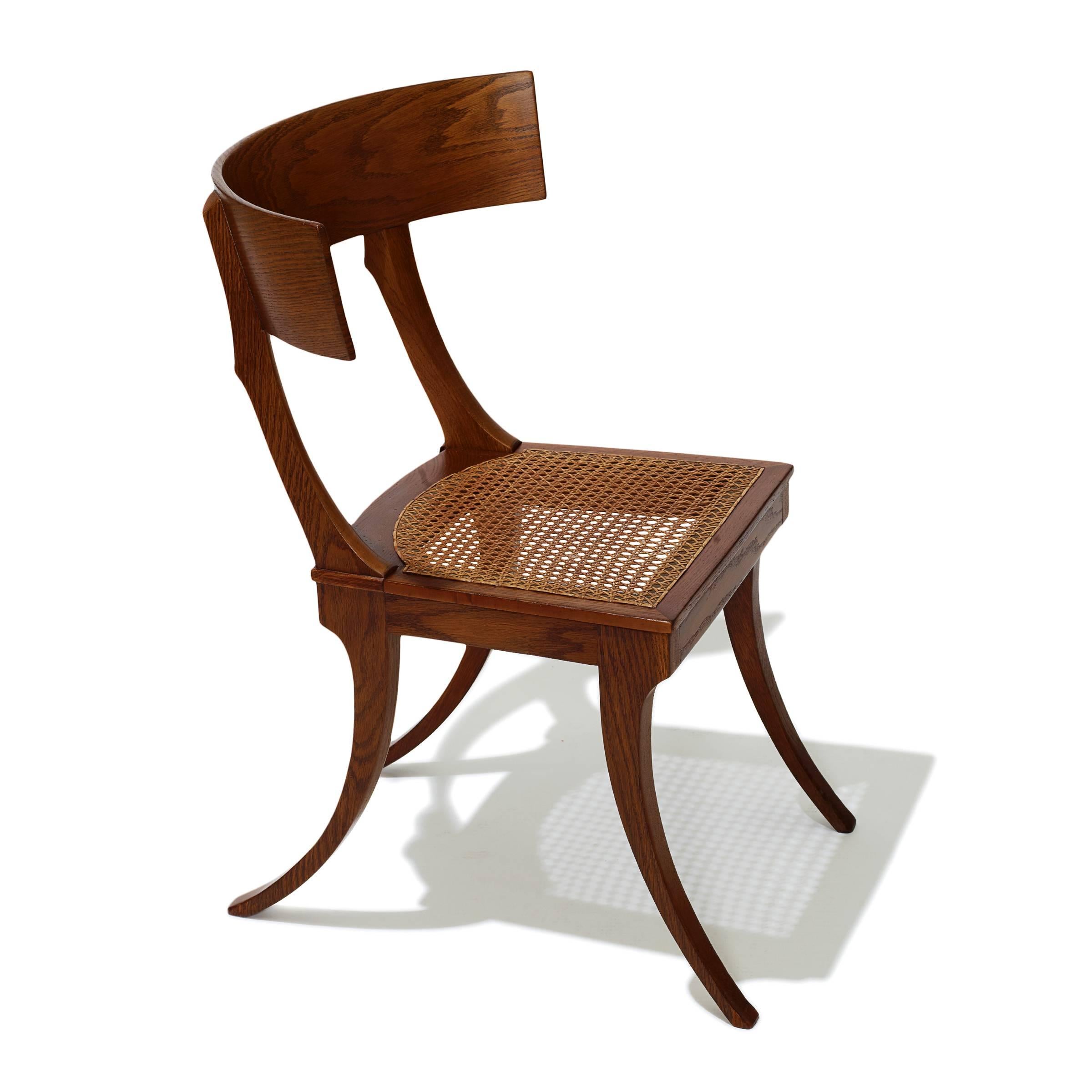 Exquisite pair of klismos chairs in oak with handwoven French-caning, Denmark, circa 1850. Identical examples of this model are in the collection of the Designmuseum Danmark in Copenhagen.

(cf: Mirjam Gelfer-Jørgensen, Danish Neo-Antique Furniture,