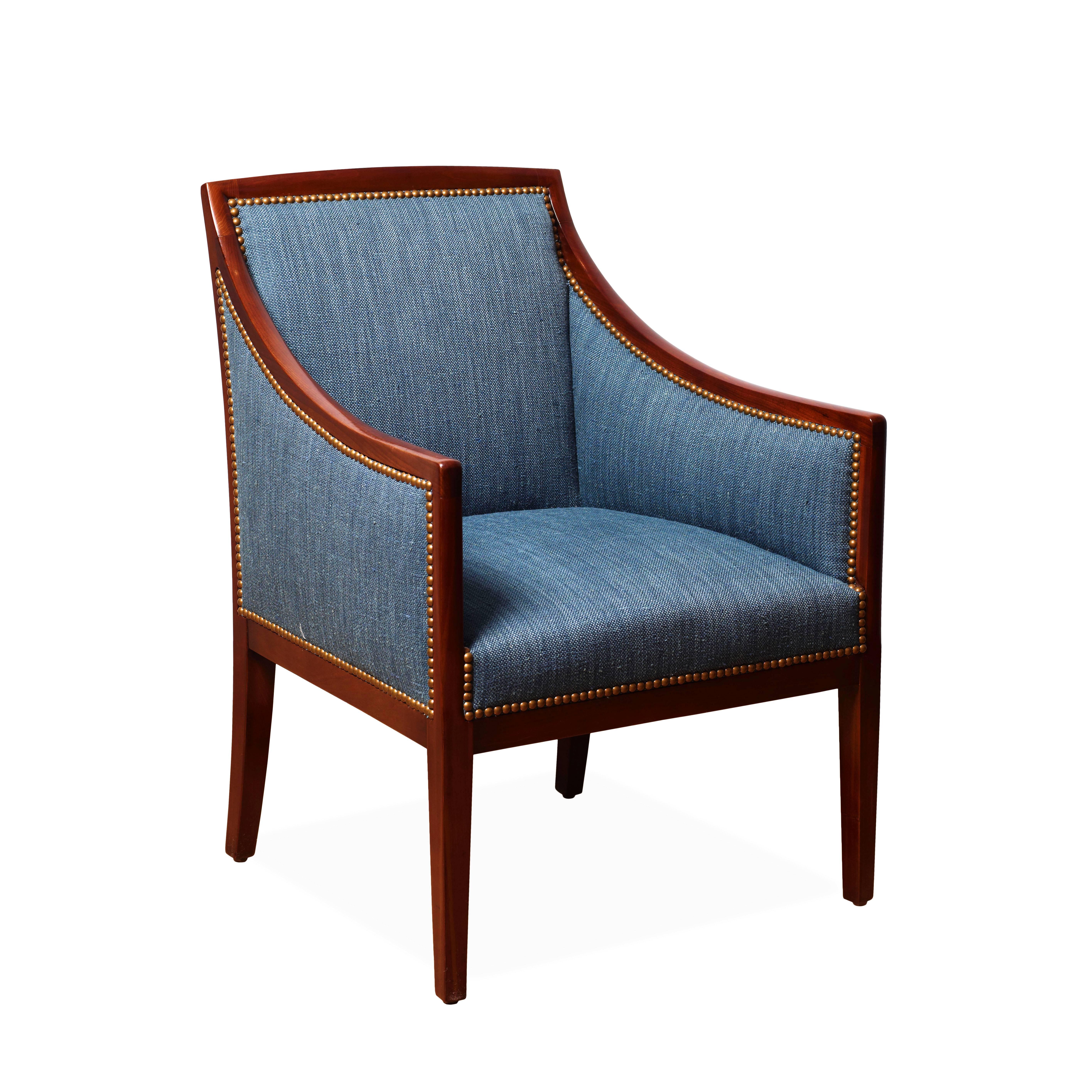 Wonderfully elegant pair of French armchairs with sinuously curved Cuban mahogany framing. Attributed to Jean-Michel Frank (1895-1941), although not stamped or numbered, the attention to detail in the construction (note the delicate entasis in the