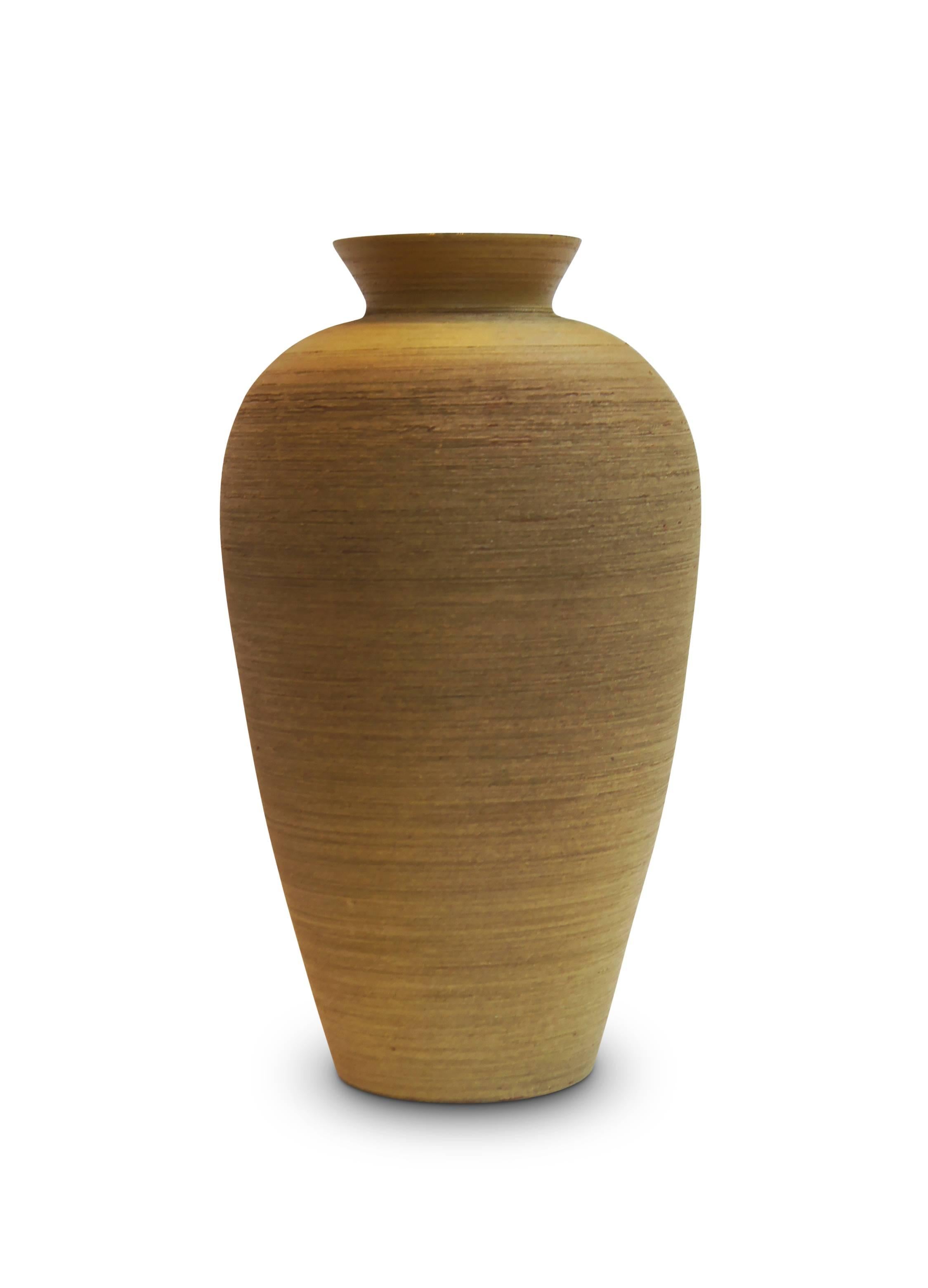 Monumental Art Deco vase duo by Upsala Ekeby in pristine condition, having superbly modeled curved and tapered sides with rounded shoulders and outwardly arced necks, outsides with wonderful raked texture and glazed a near-matte gold-brown, and