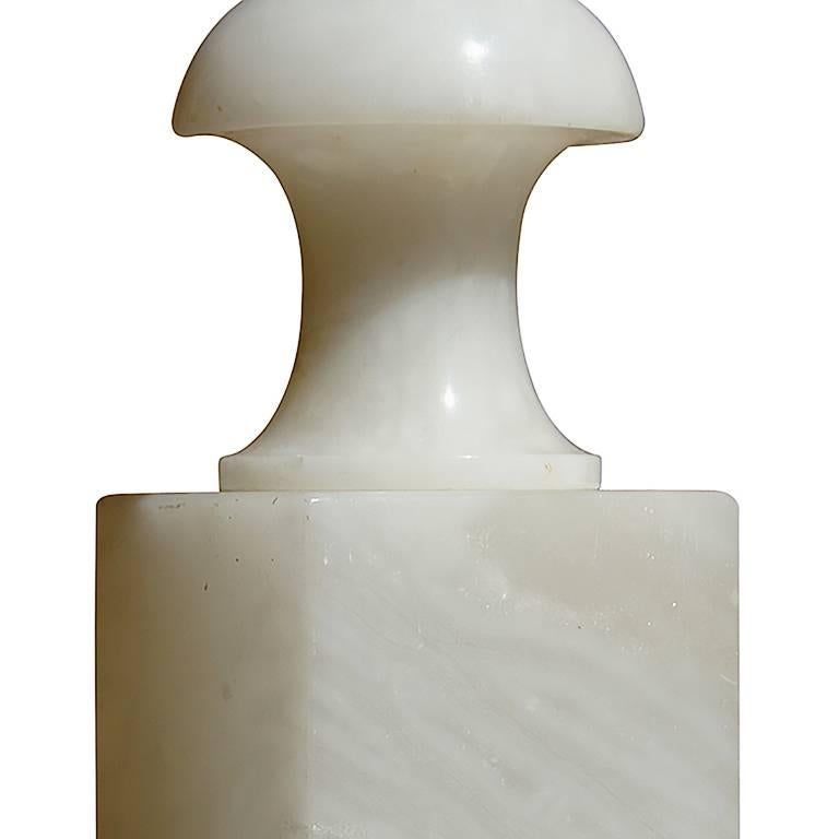 Pair of tall table lamps with baluster form, having a square column under a turned convex-sided finial, in white-light grey alabaster with white veining, by Bergboms (probably sourced in Italy), Sweden, 1960s.