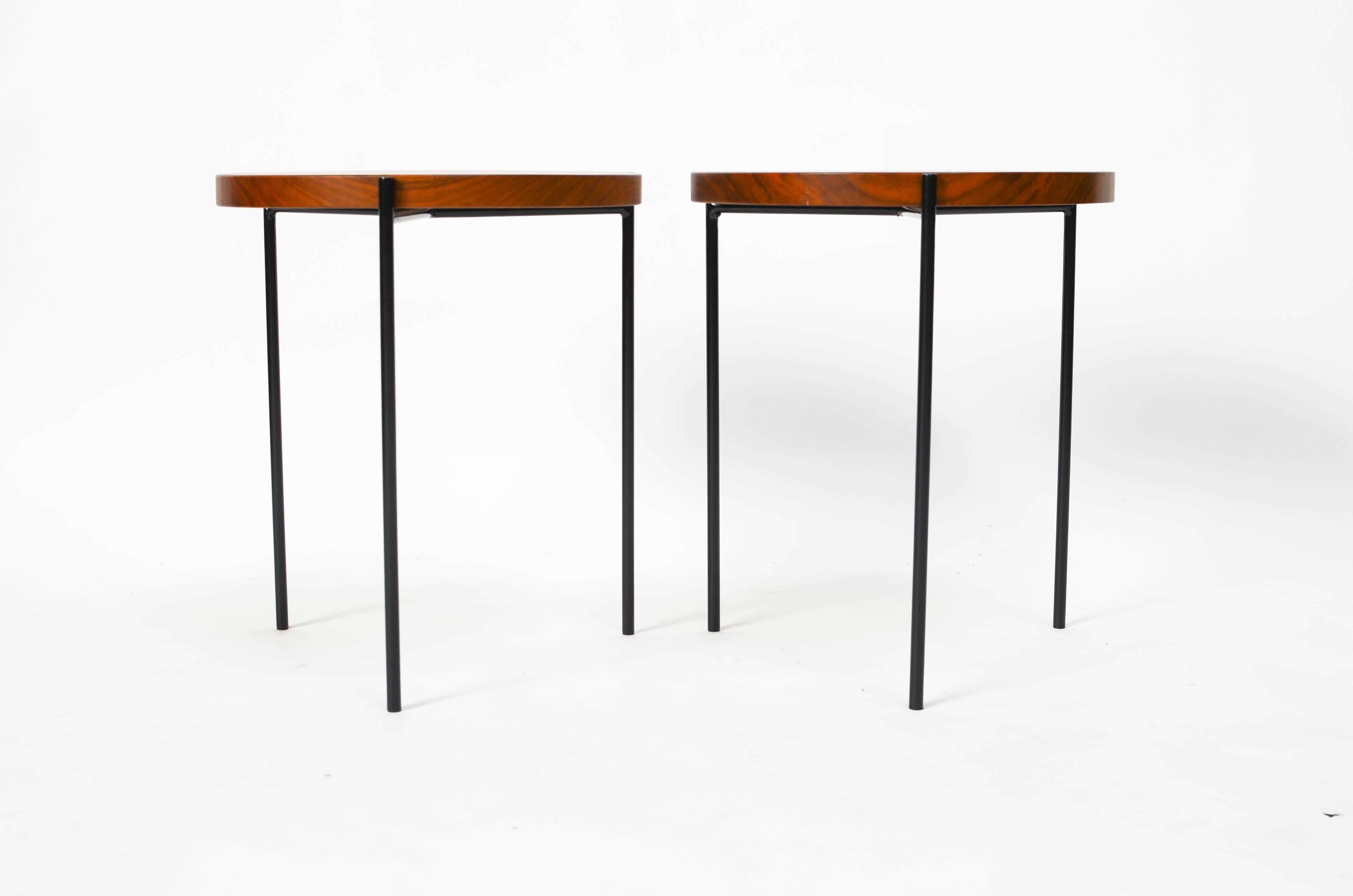 Beautiful iron and solid walnut tripod side tables by Just in Modern. Tables also stack for convenience. 

Up to 12 available for custom order. Options for tops include walnut, teak or marble (+$150). Lead time is 4 weeks, sometimes we are able to