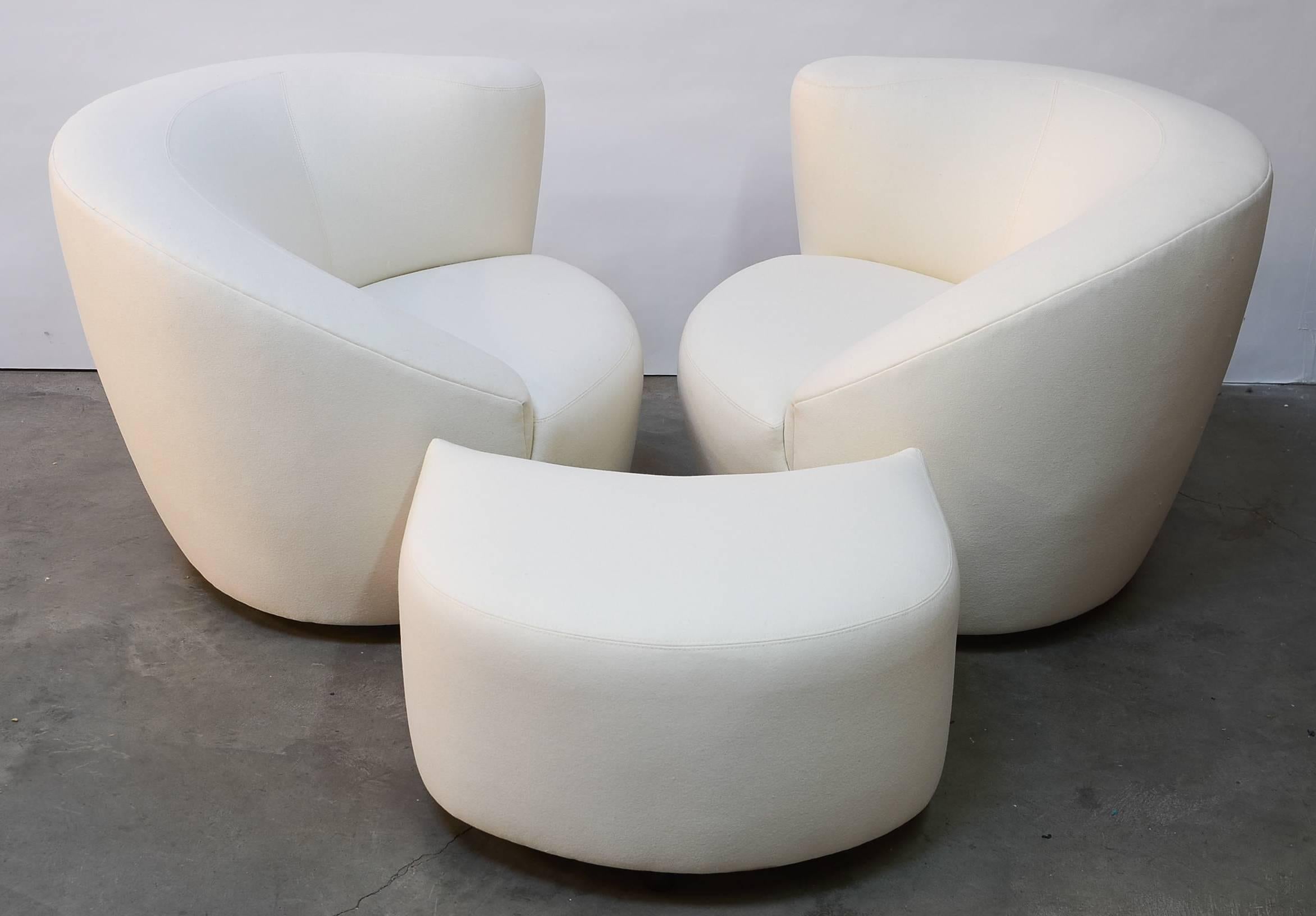 Offered is a beautifully restored set of Vladimir Kagan lounge chairs expertly reupholstered in boiled wool by Maharam (Denmark). The internals have been correctly restored to above factory spec using latex foam and Pirelli strapping. Included is an