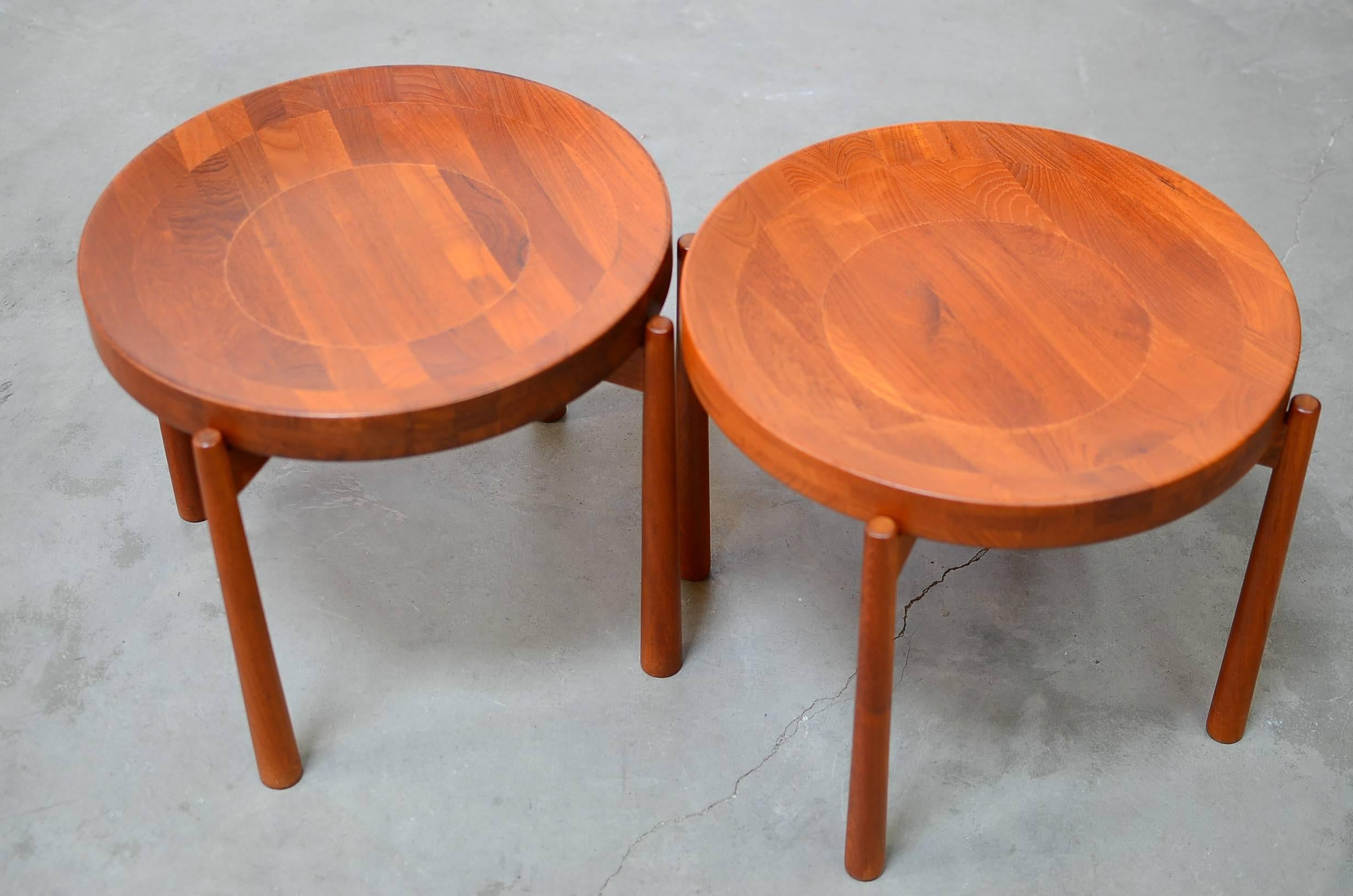 Stunning pair of flip-top; solid teak side tables in the style of Jens Quistgaard for Dux. 