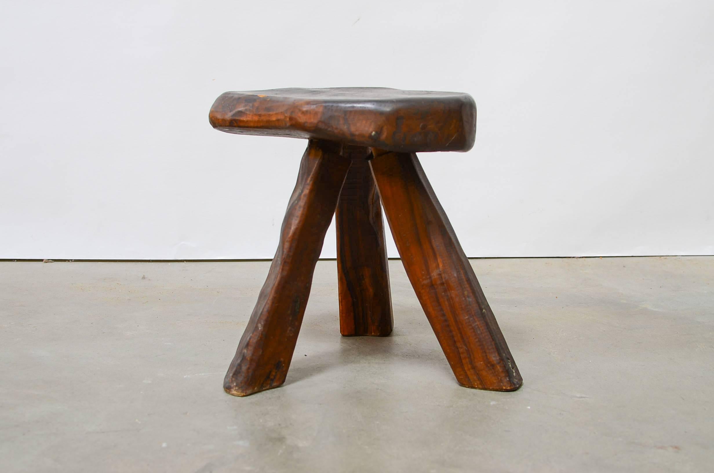 Handsome little French tripod stool in the manner of Alexandre Noll, circa 1950s.
