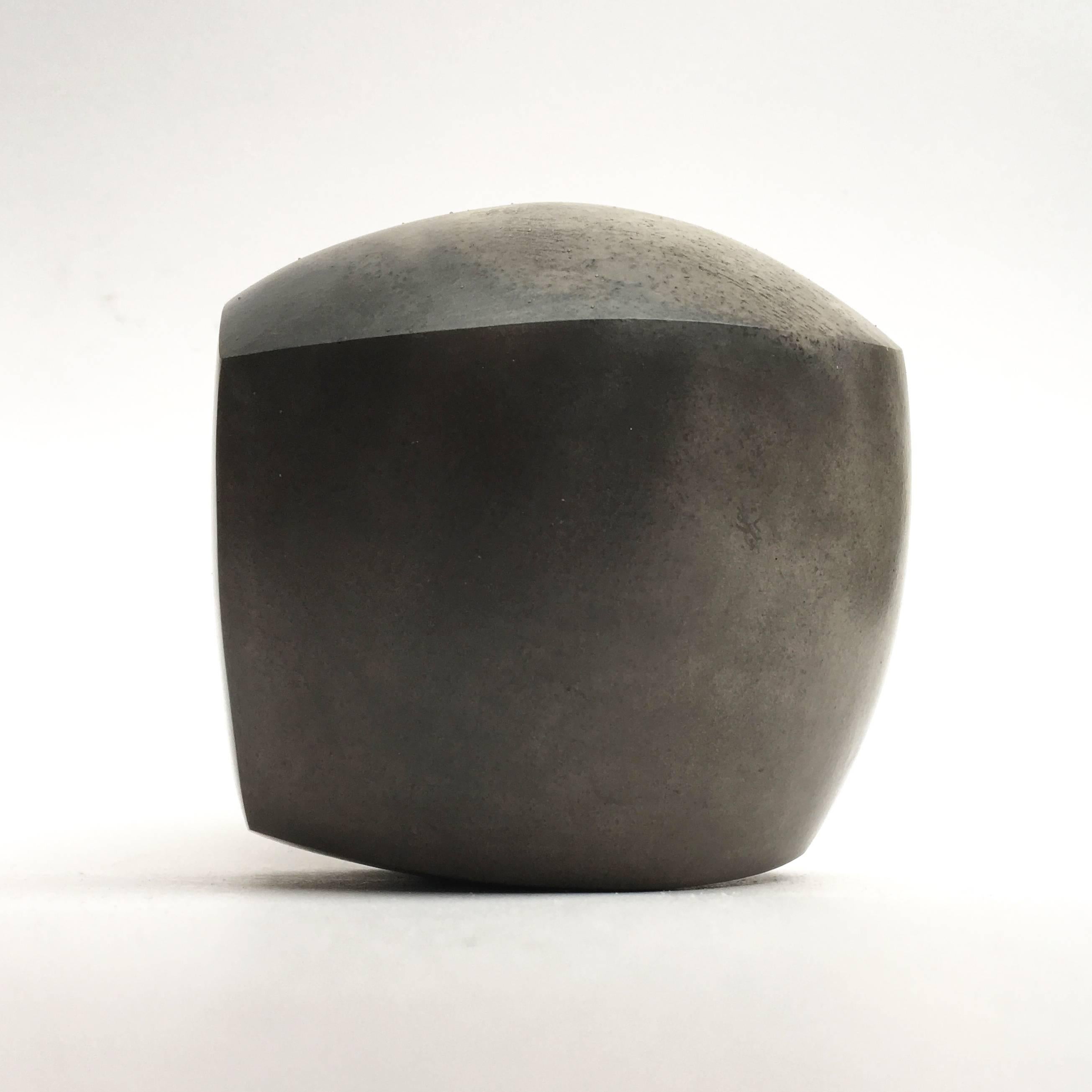 Amazing Kat Evans raku clay sculpture #1 (small) fired with coffee grounds. 

Asymmetrical sculptures speak of the processes that made them: pinching, coiling and paddling. Hours of careful and deliberate burnishing create a perfectly smooth