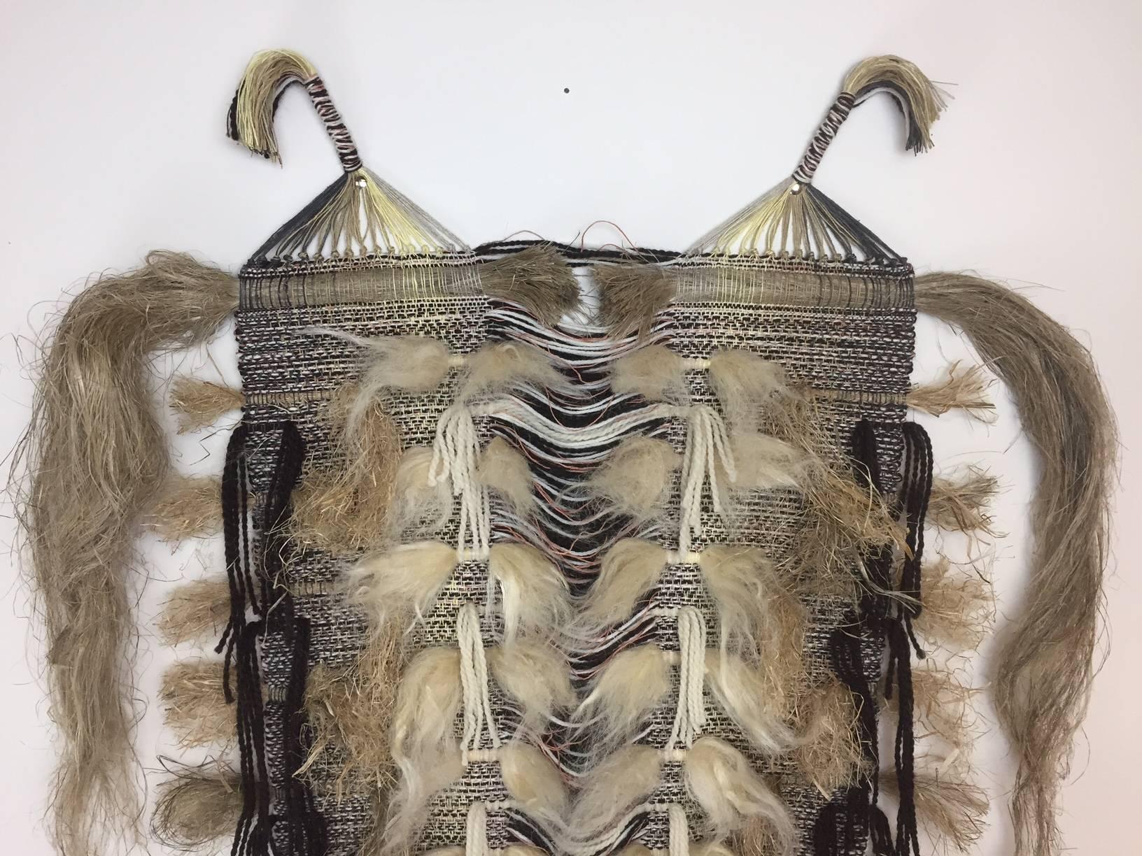 Stunning natural weaving titled, "Regeneration : Go Ahead, Make the Cut" by artist, Neil Goss, 2017. Hemp, wool, alpaca, and natural dyes. 

Neil Goss lives in the countryside of Eudora, KS where he focuses his art on Earth processes