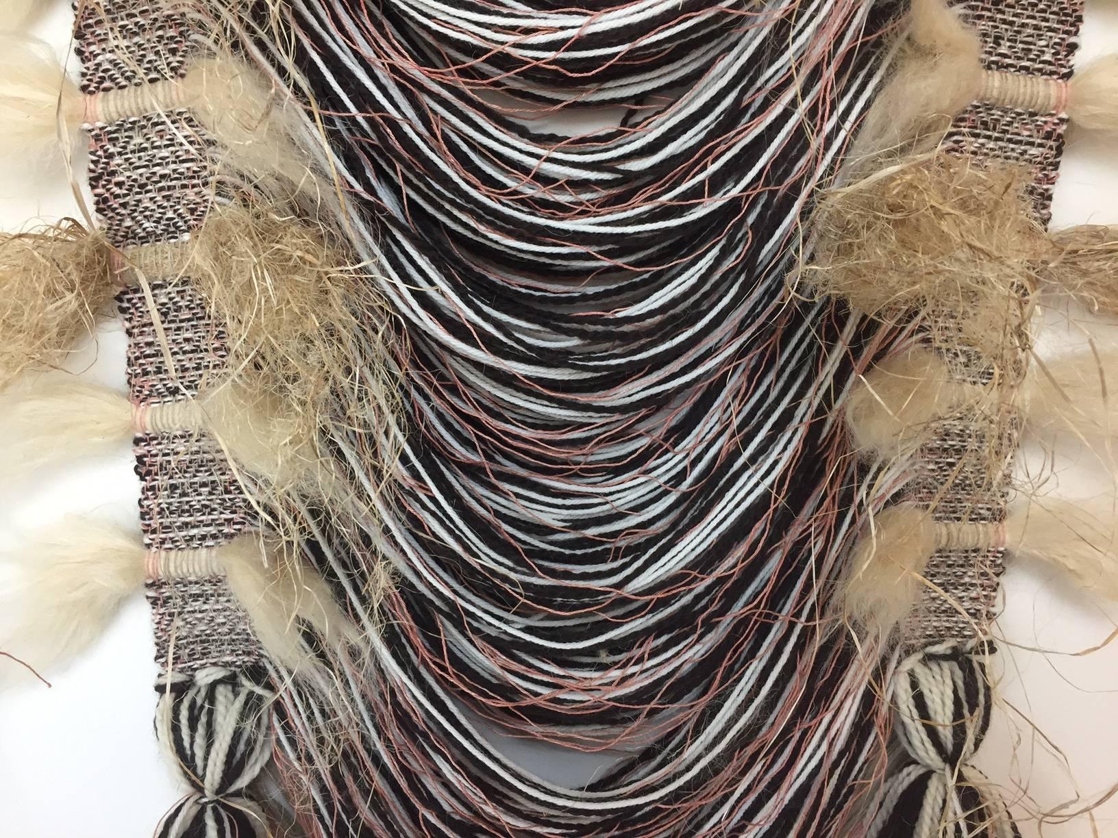 Stunning natural weaving titled, "reGeneration : Go Ahead, Make the Cut" by artist, Neil Goss, 2017. Hemp, wool, alpaca, and natural dyes. 

Neil Goss lives in the countryside of Eudora, KS where he focuses his art on Earth processes