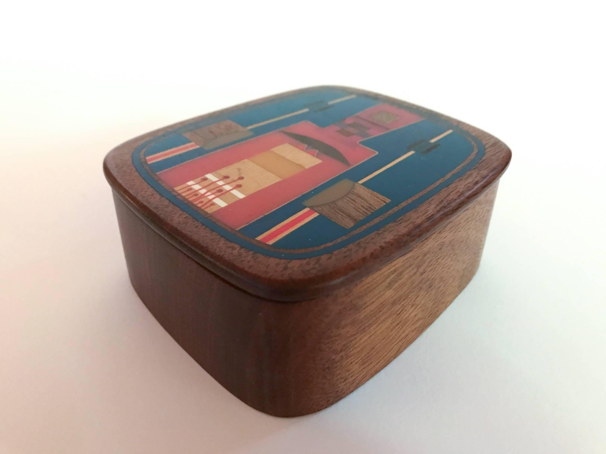 Beautiful wood and resin inlaid box by San Francisco Bay artisan Robert McKeown (1931-1989). Signed by artist.