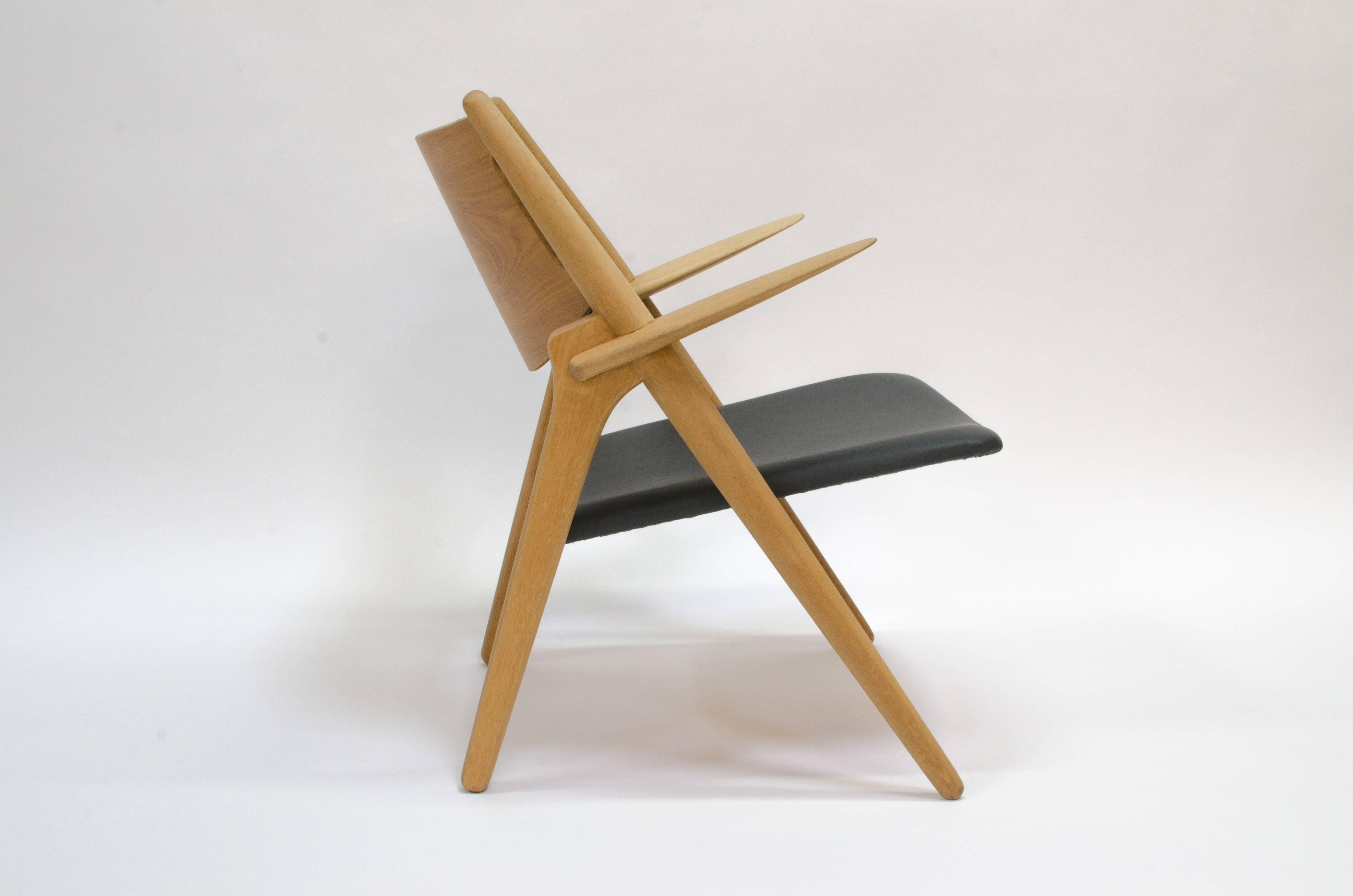 Scandinavian Modern Hans J. Wegner Sawbuck Lounge Chair Model CH-28, 1951 For Sale