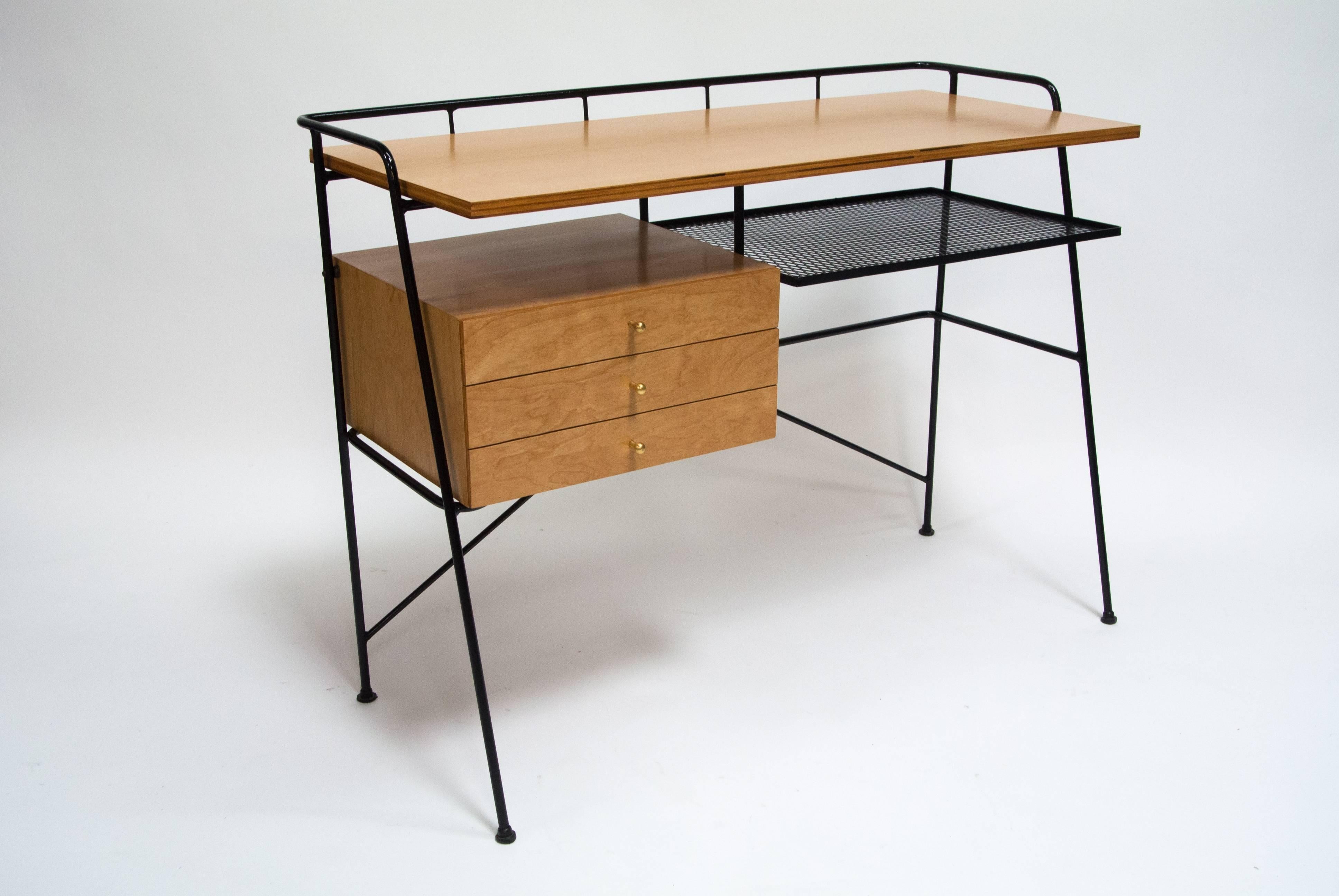 Rare iron and birch desk designed by Arthur Umanoff for Elton, circa 1950s. Great desk for compact spaces. 

Desk top height 30.75