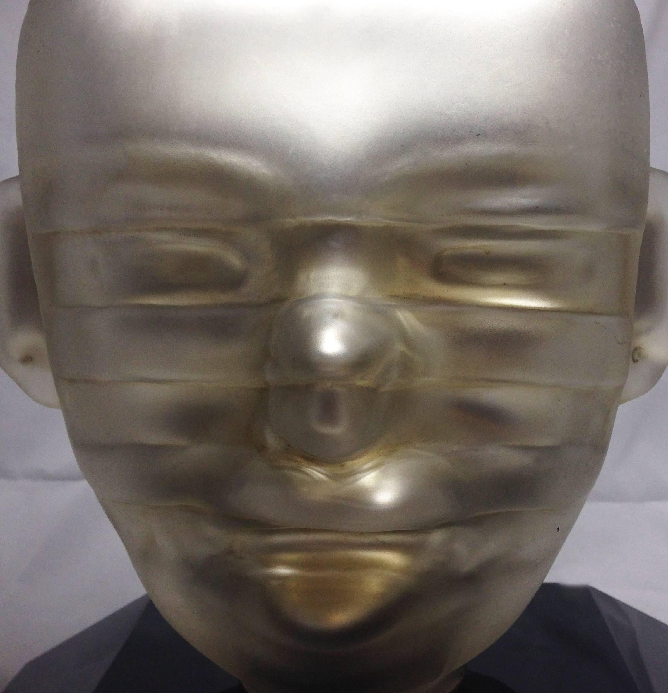 Mercury glass tribal mask sculpture signed by Pedro Ramirez Vazquez, black marble base.
