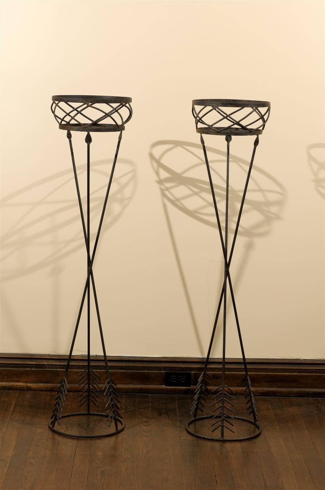 Pair of 20th century iron jardinieres in the neoclassical style.