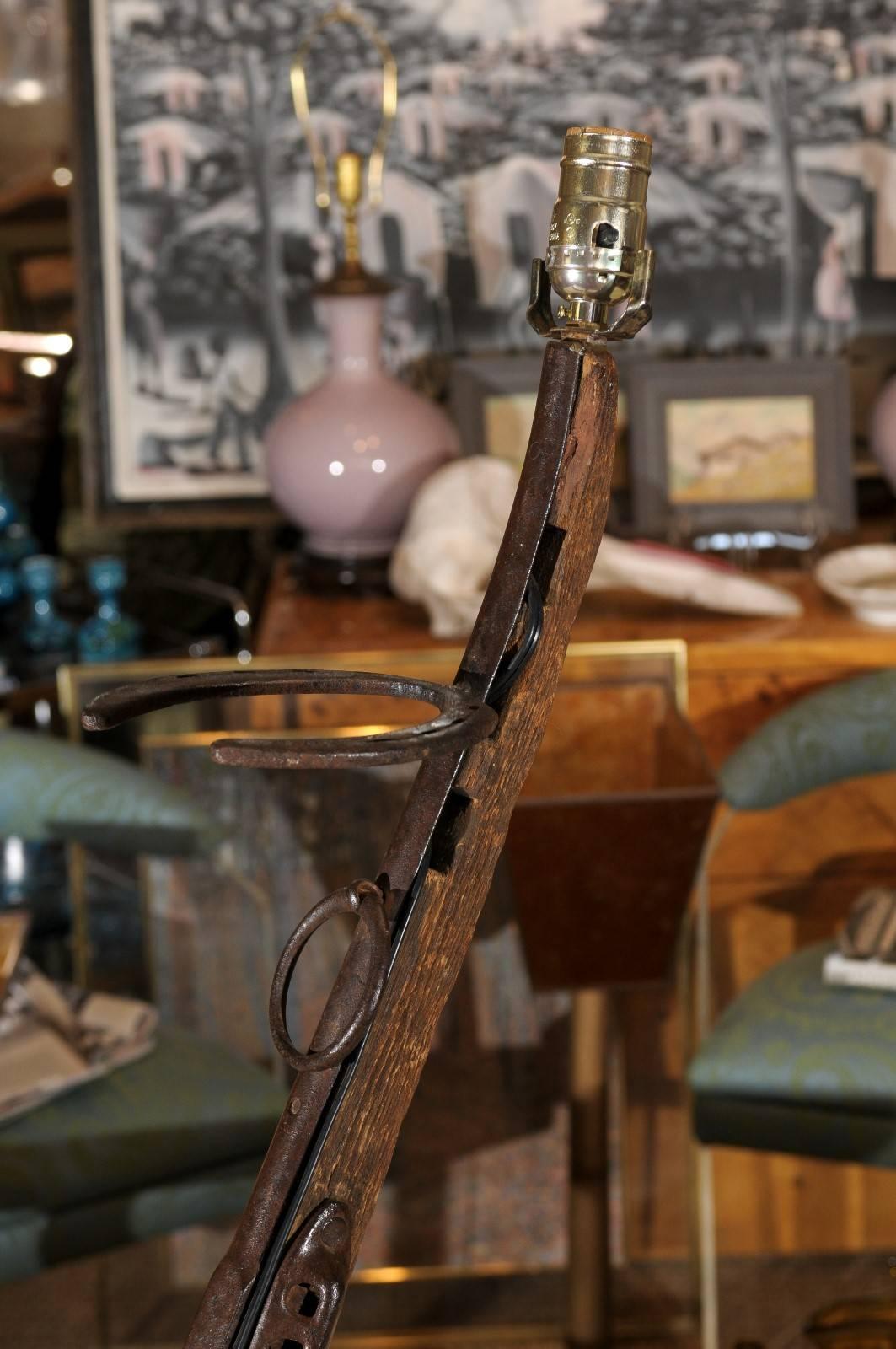 20th Century Vintage Folk Art Gun Lamp of Wrought Iron and Driftwood For Sale