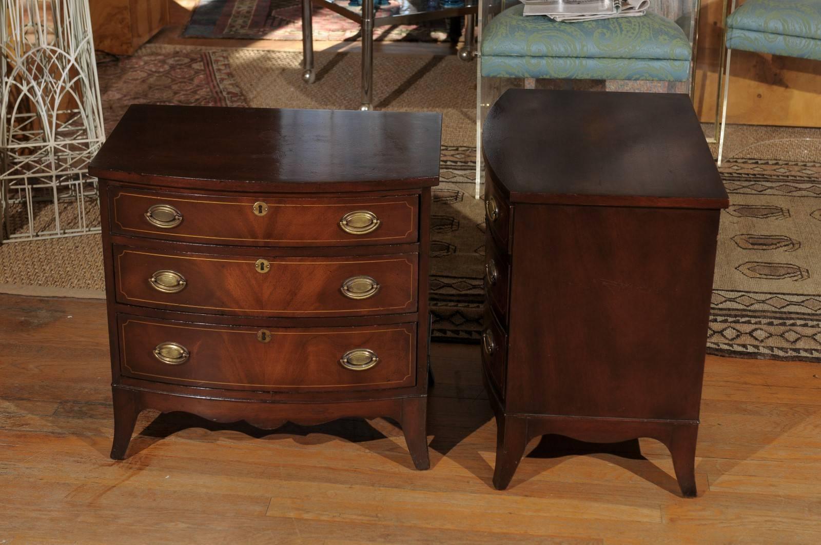 Pair of Petite Georgian Bow Front Chests 1