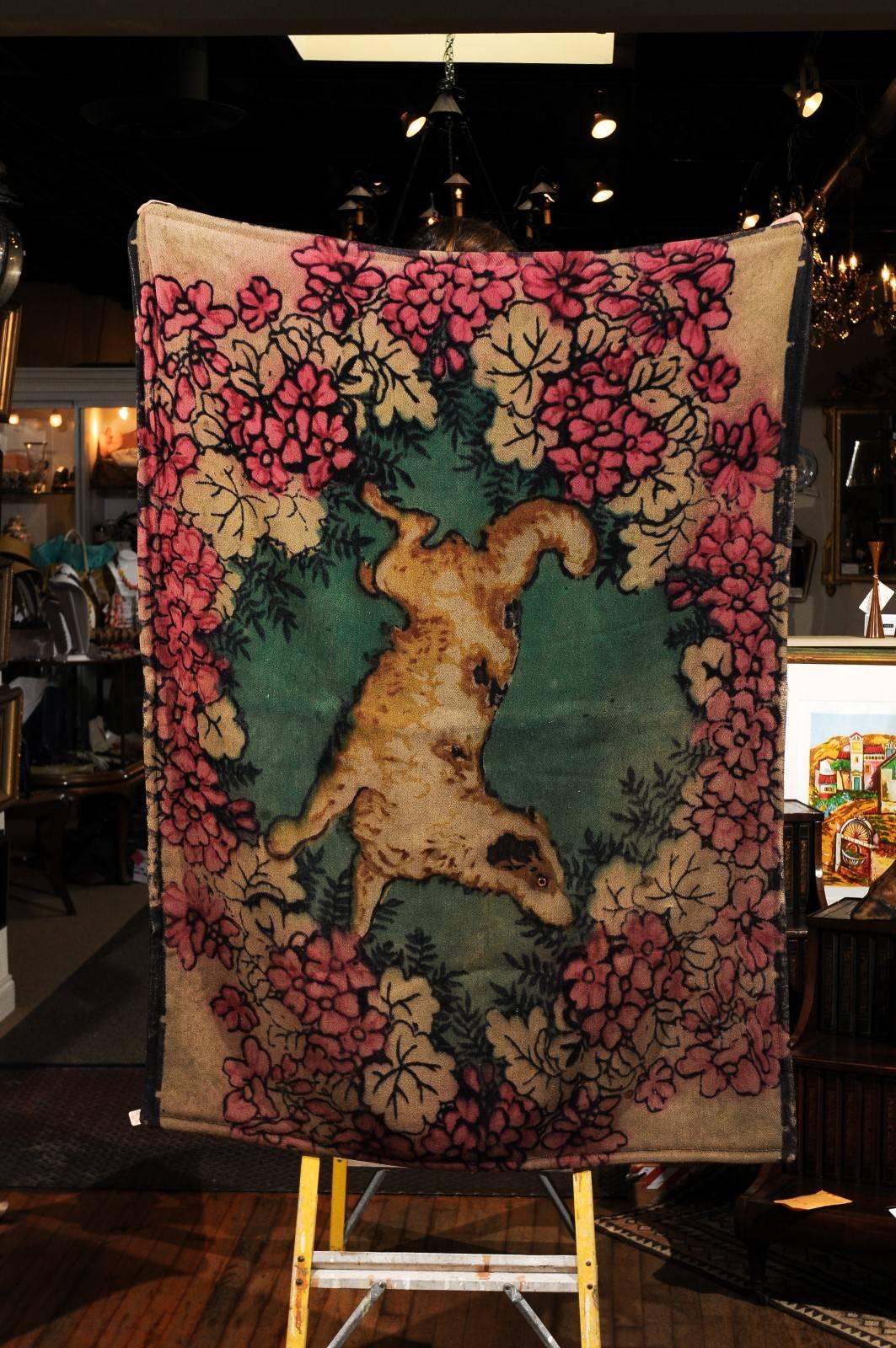 19th century Victorian wool and angora carriage blanket or lap robe. Lovely design with a wreath of flowers and garland surrounding a dog with an eye made of glass. The reverse side is dark brown. Lap robes by Chase and Company were manufactured by