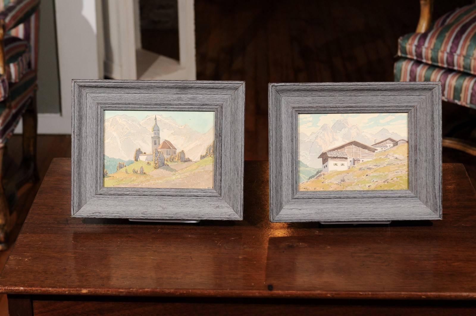Pair of petite early 20th century detailed watercolors of continental mountainscapes. Signed KK. T. and held in a grey-washed oak frame.