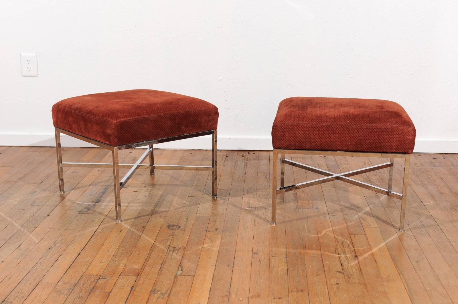 Mid-Century pair of chrome X stretcher base stools with orange (basket weave pattern) suede upholstered seats made in the style of Paul McCobb.