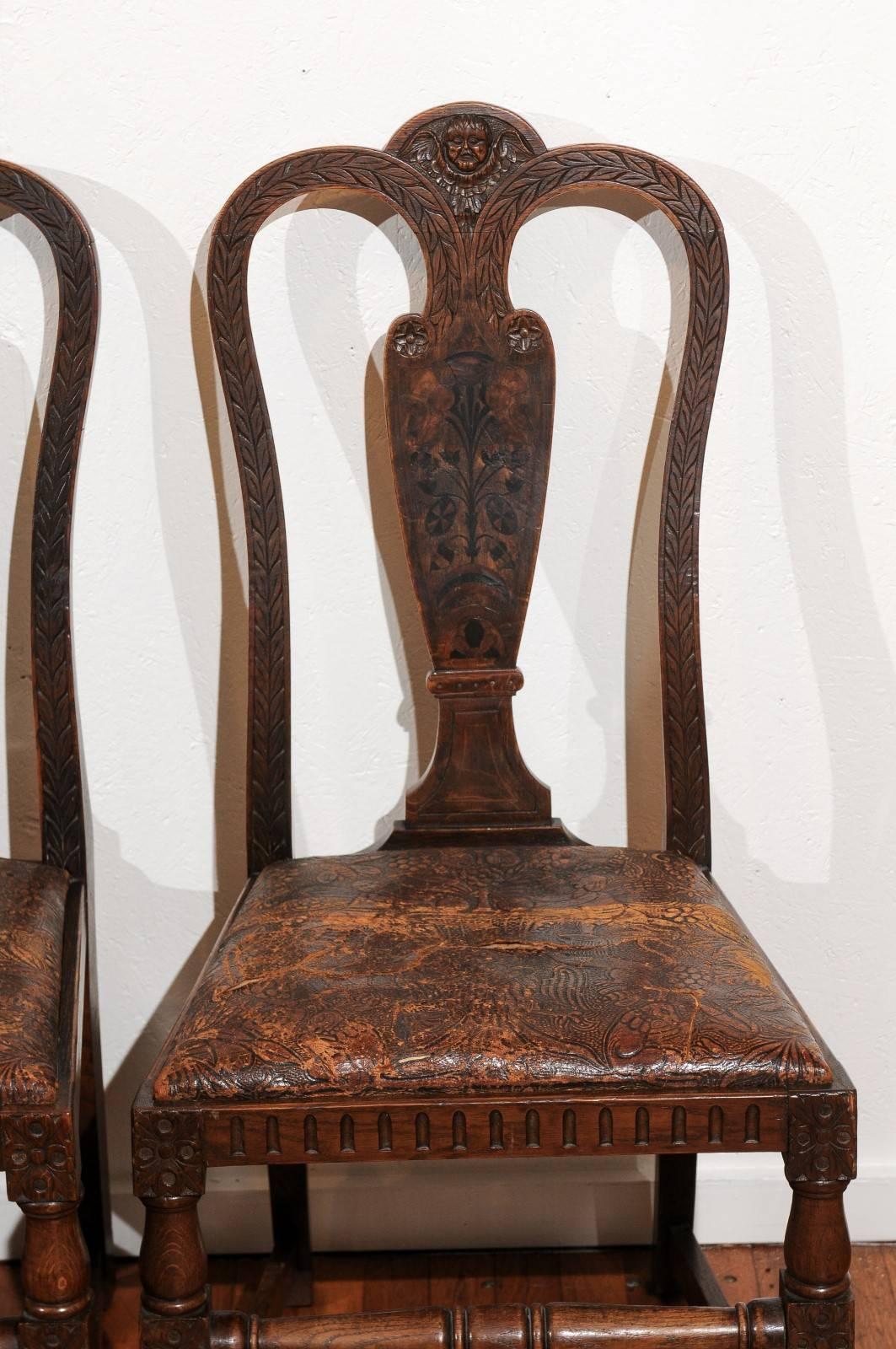 Leather Set of Eight English Carved and Inlaid Oak Dining Chairs