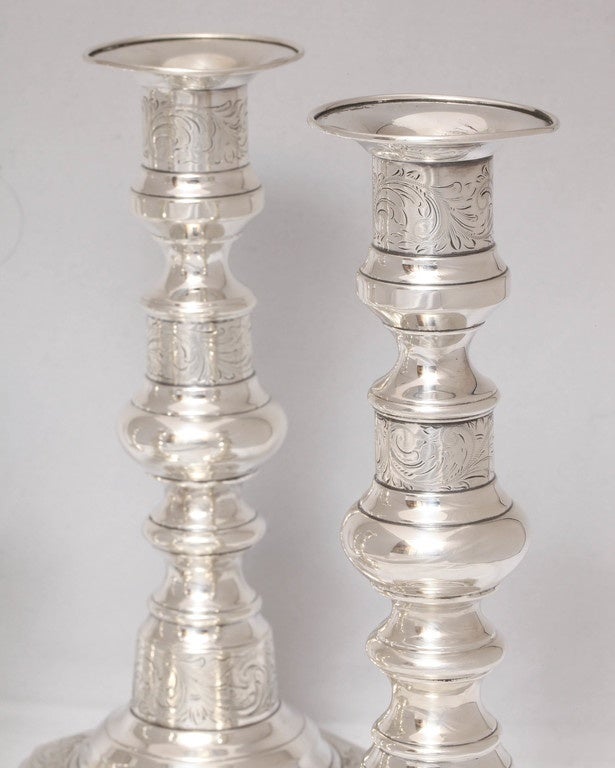 Early 20th Century Suite of Four American Colonial Style Sterling Silver Candlesticks by Gorham