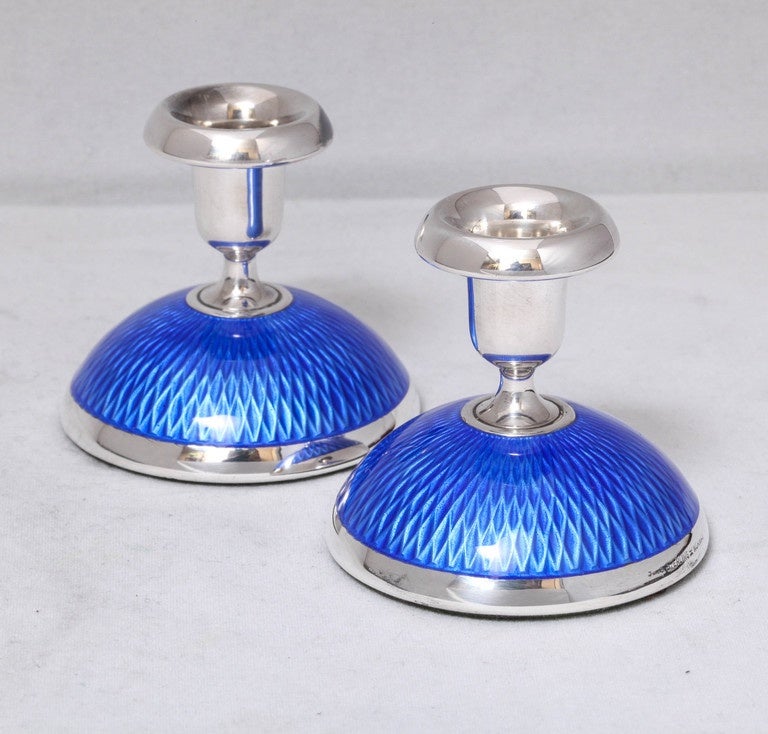 Pair of Art Deco, sterling silver and blue guilloche enamel candlesticks, Norway, circa 1930s, David Andersen maker. Dimensions: 2