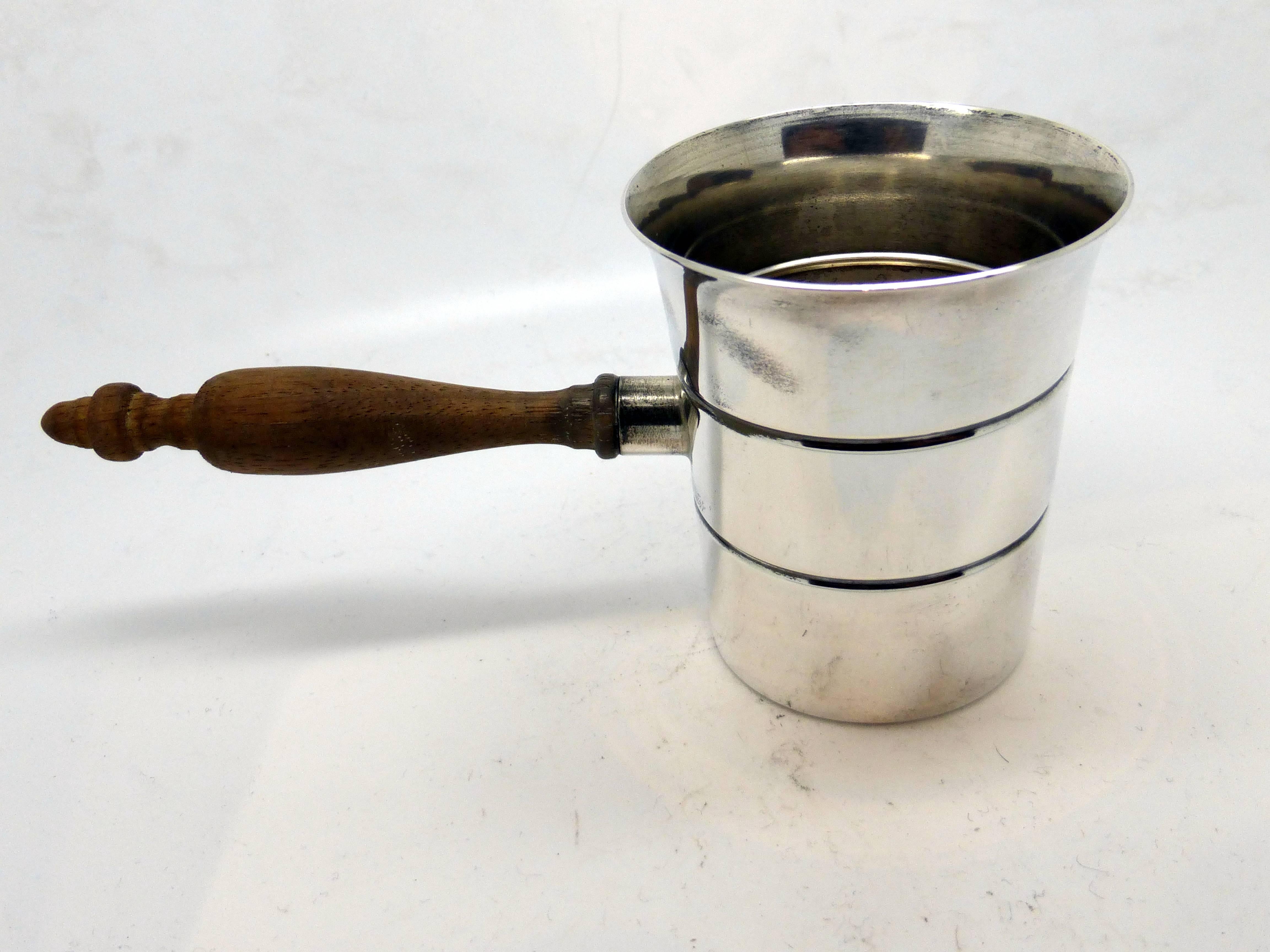 Unusual, Art Deco, sterling silver shot glass or jigger with wooden handle, International Silver Co., Wallingford, Ct., circa 1930s. Ounces of liquid held are clearly marked on sterling silver. Shot glass or jigger will hold more than two ounces. @2