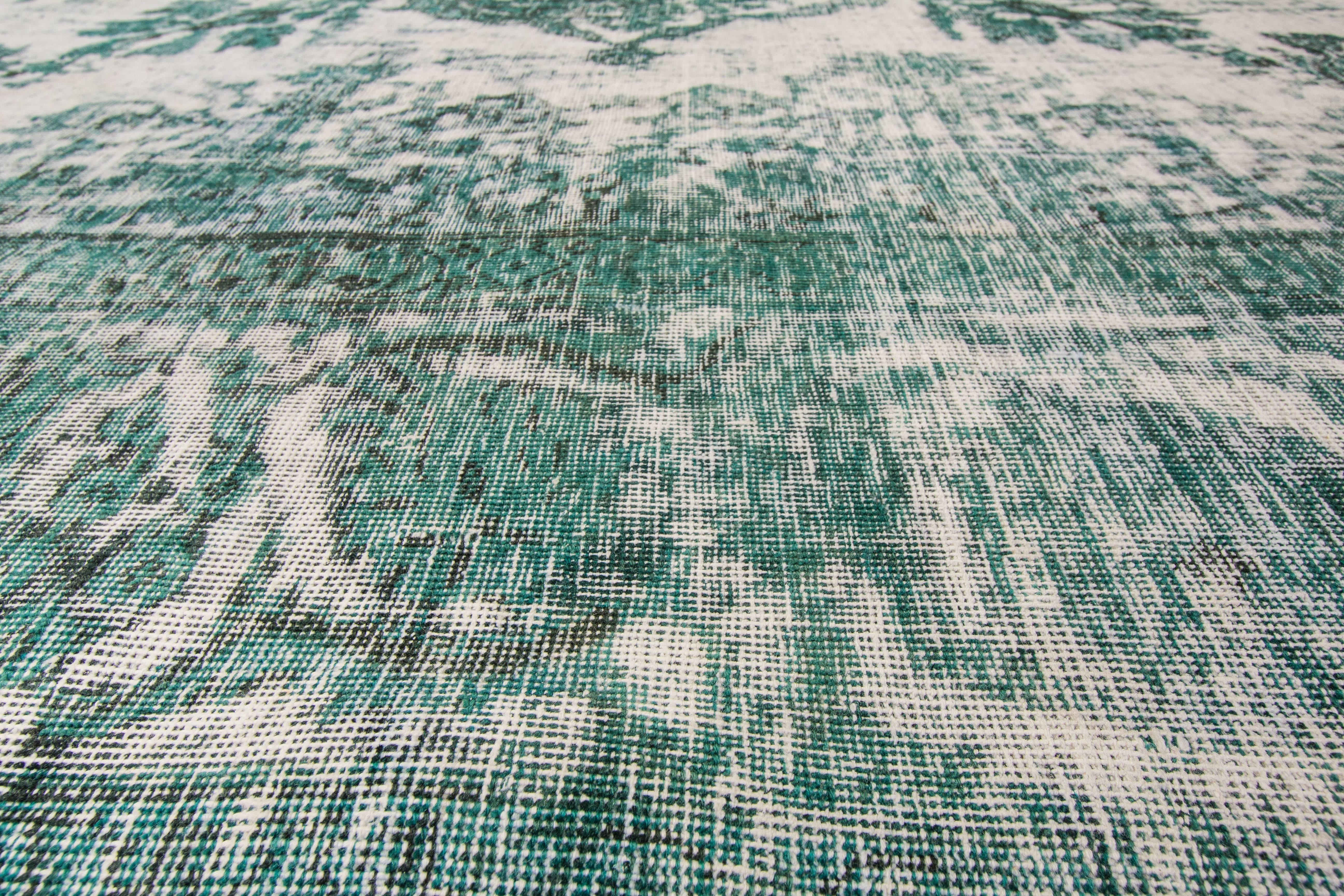 green antique rug