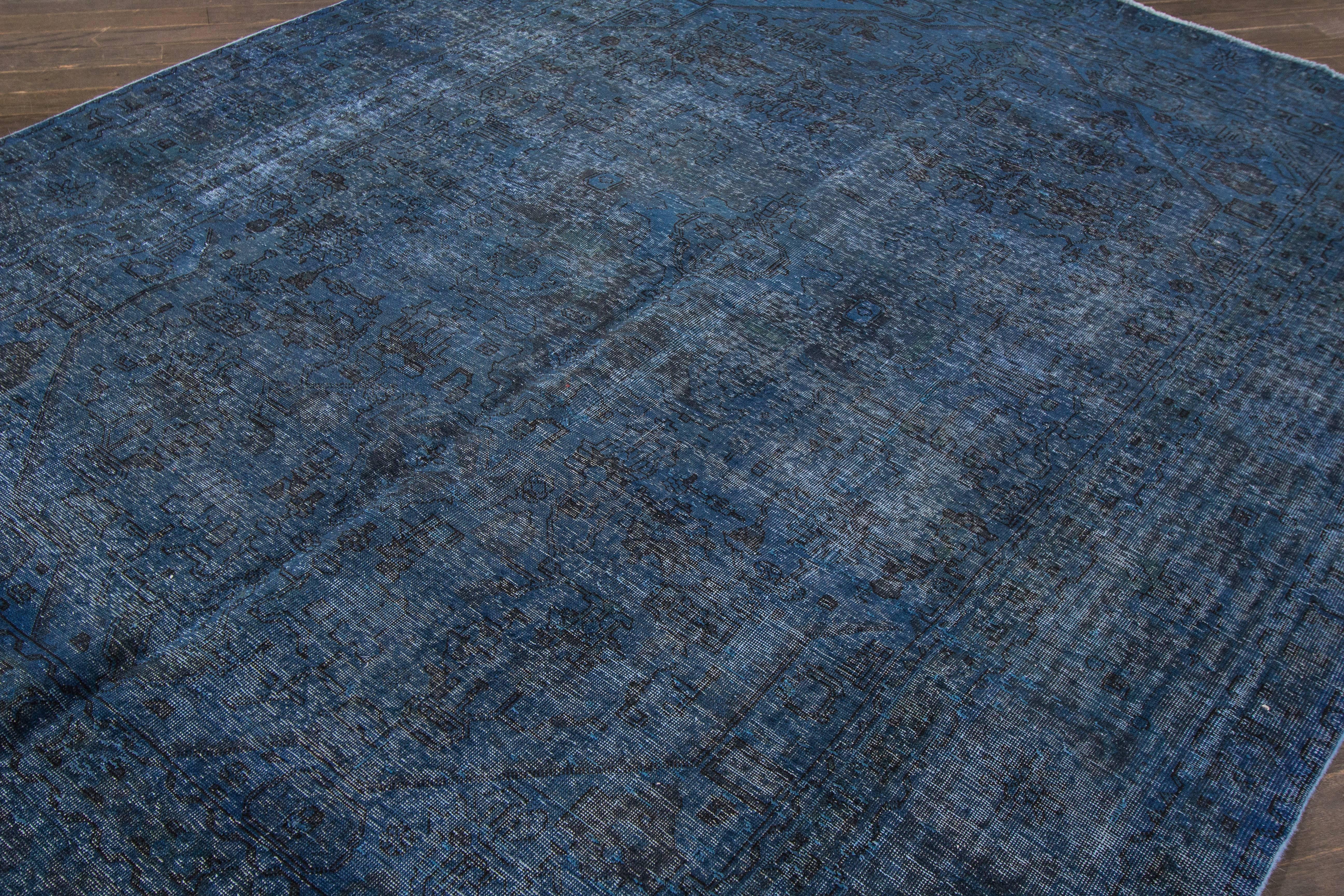 Color pattern and an intimate patina, this vintage Persian overdyed rug has it all. This is an absolutely stunning and impeccably handmade Persian rug. With its distressed composition, luxurious blend of modernism and color, this vintage overdyed