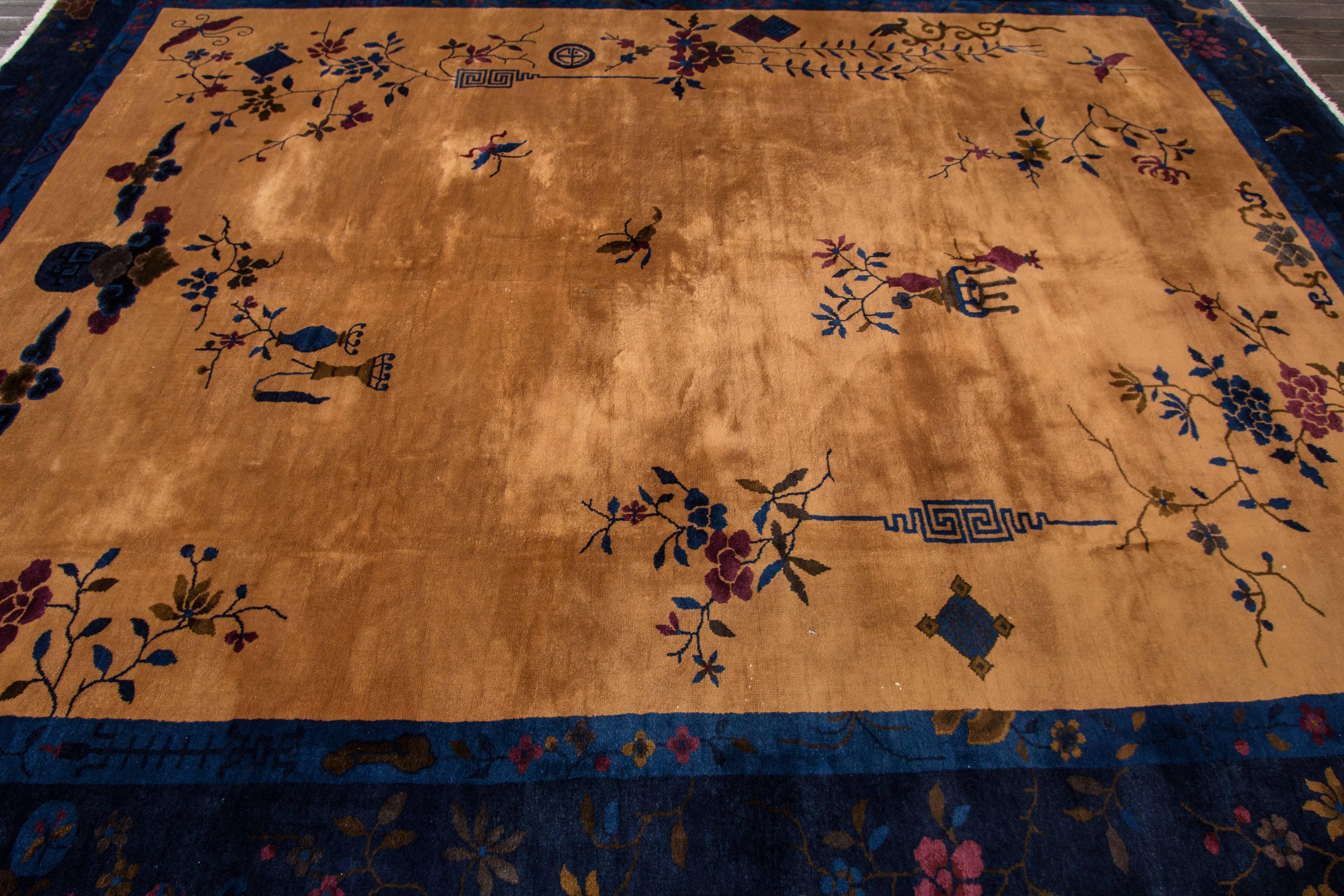 Measures: 8'.10 x 11'.7
Antique Chinese rugs as opposed to most of the antique rug productions were woven almost exclusively for internal consumption. Since they were mostly sheltered from European and western influences, this offers us the reason