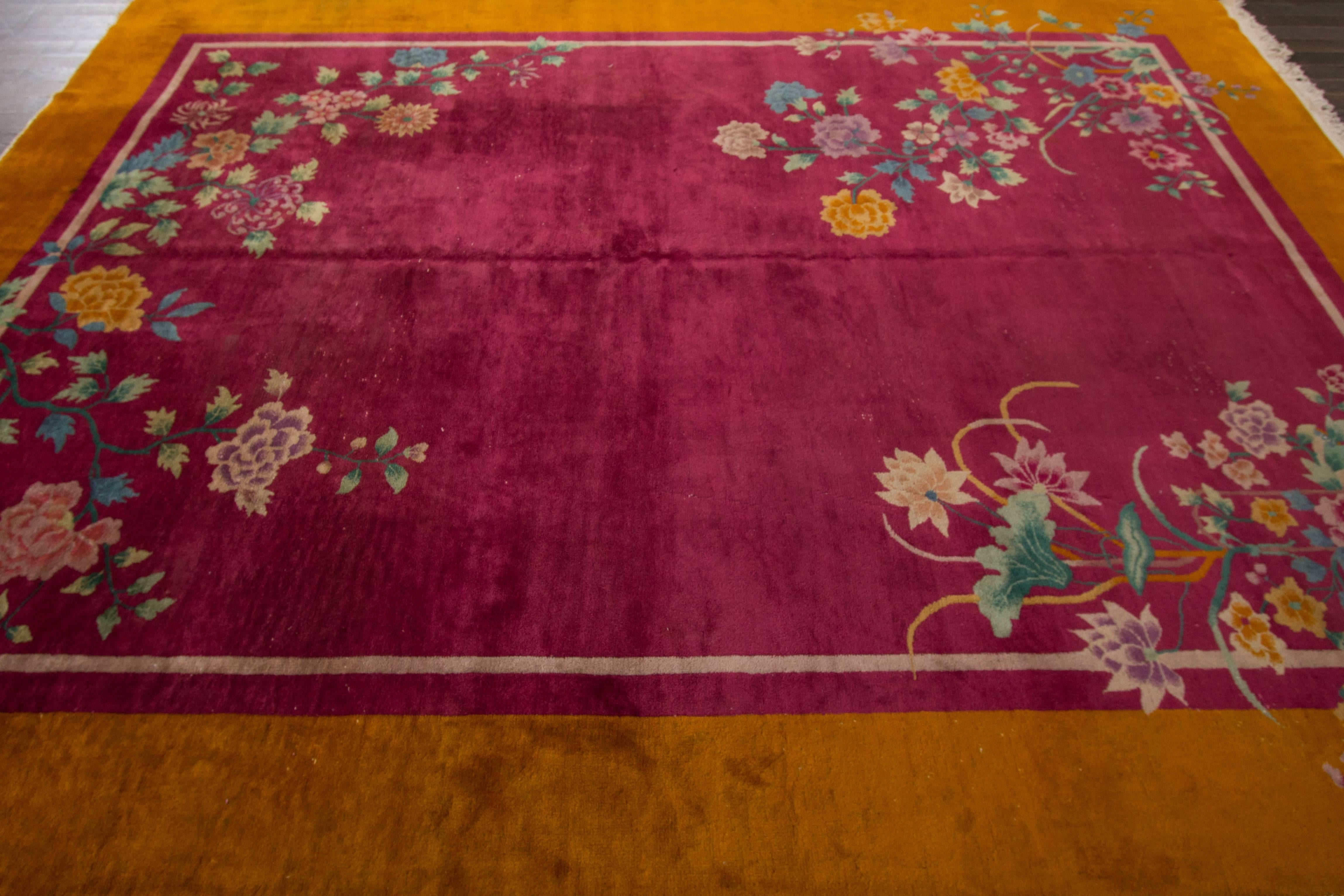 A Chinese Nichols carpet from the early 20th century. Measures: 8'.8 x 11'.2.