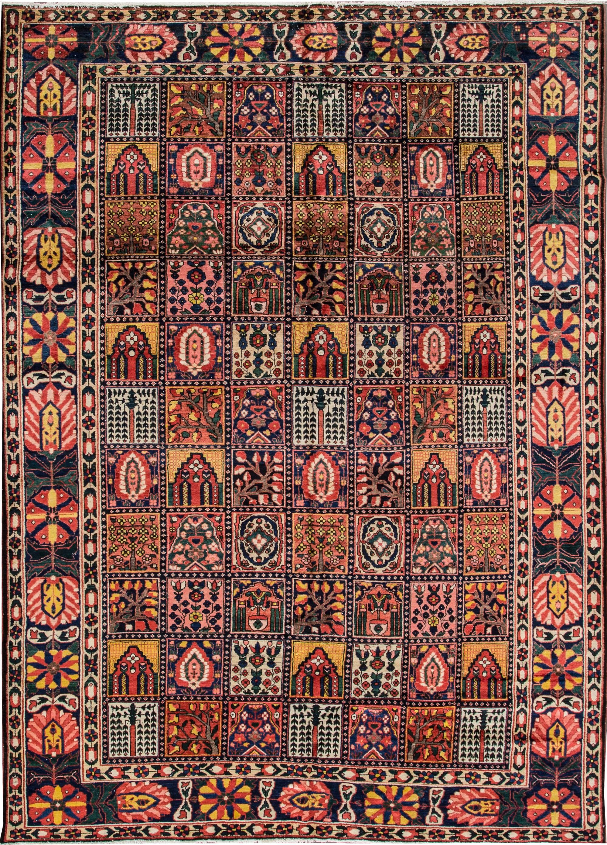 Beautiful Persian Bakhtiari hand-knotted with a rust field and multicolor accents in all-over geometric floral design.
This rug measures 8'5